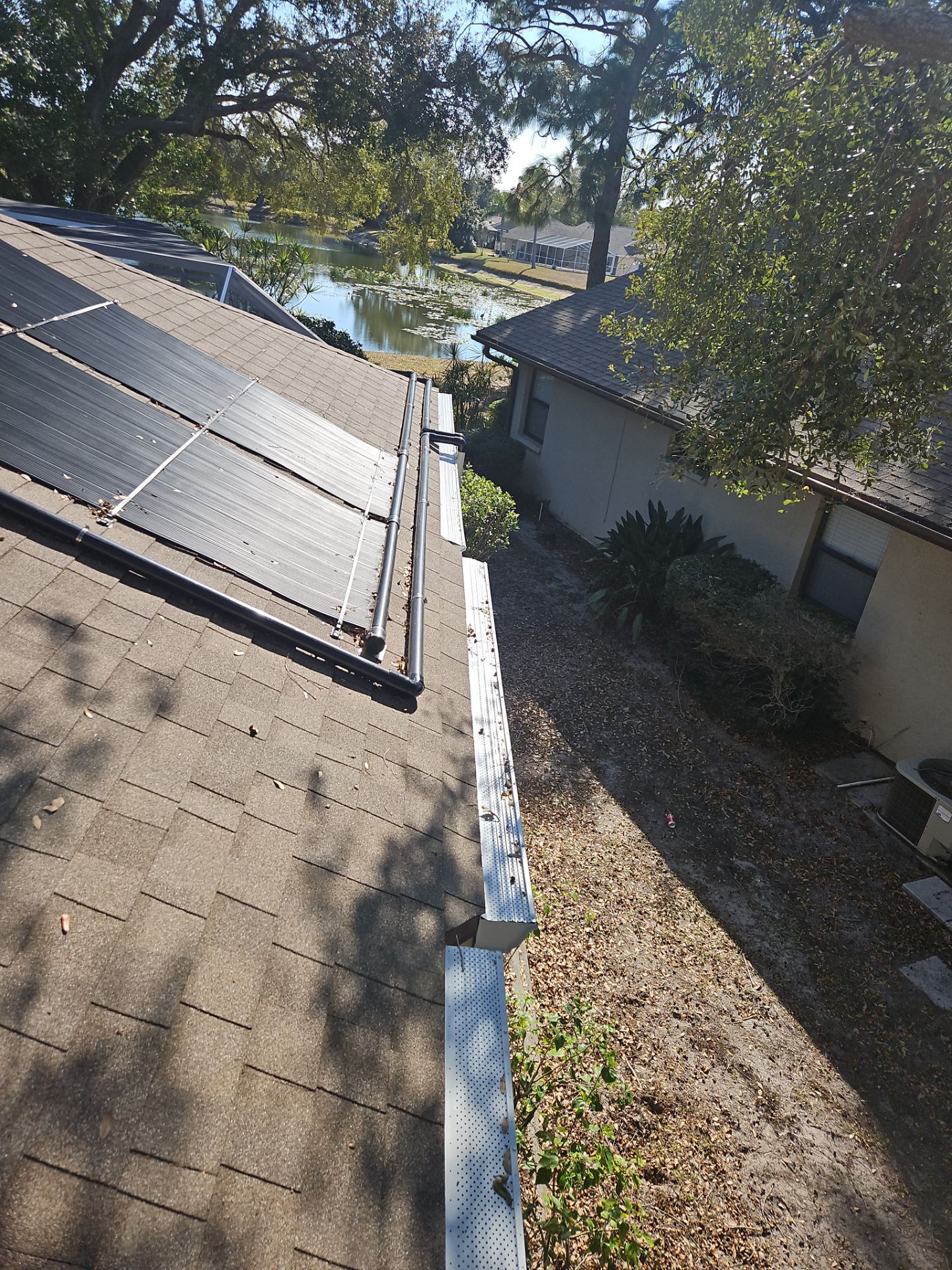Seamless Aluminum Gutter Installation using 6 Inch Seamless Gutters in Sarasota FL by Gutter Professors
