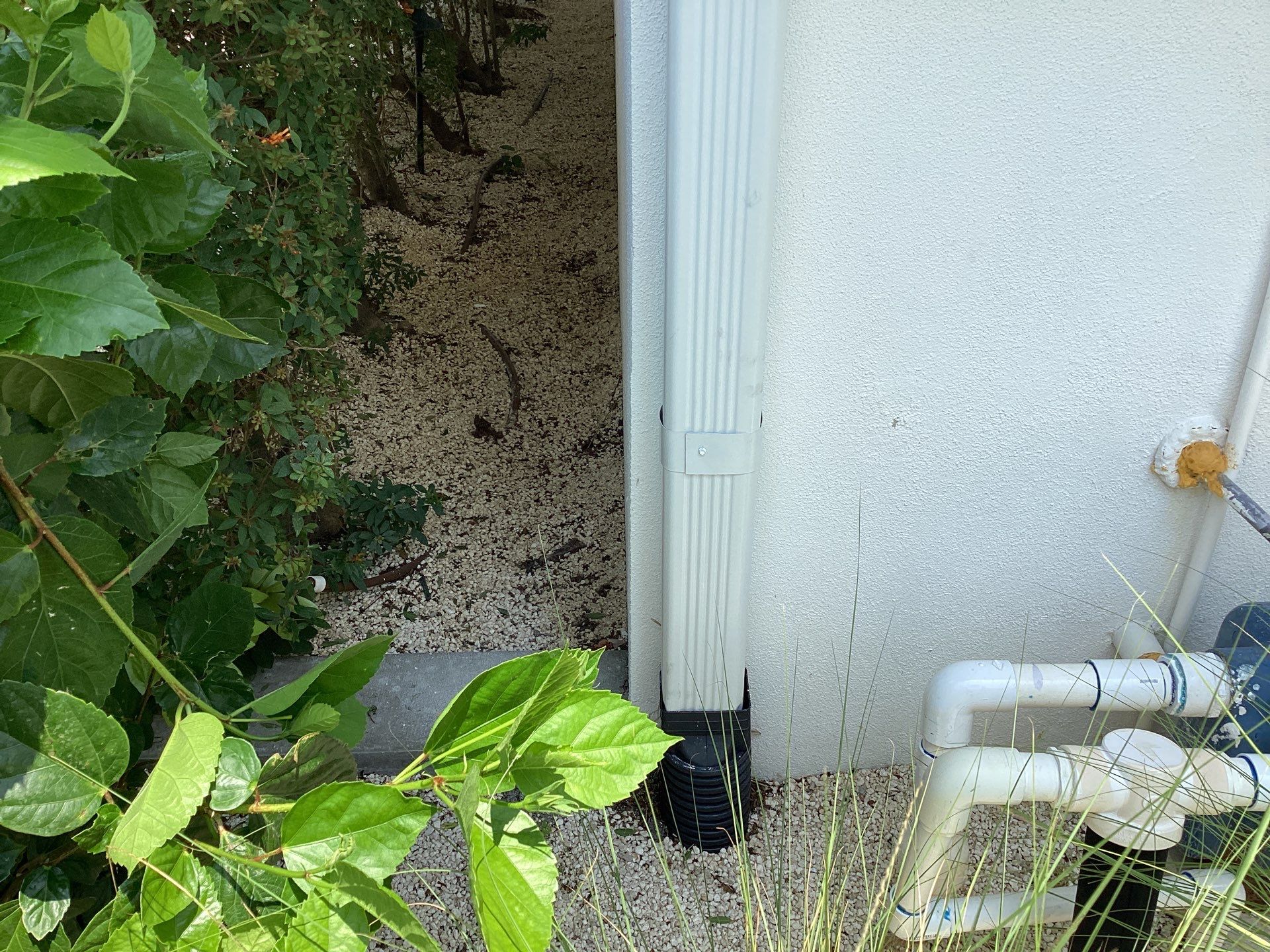 White Seamless Gutters and Downspouts in Sarasota FL by Gutter Professors