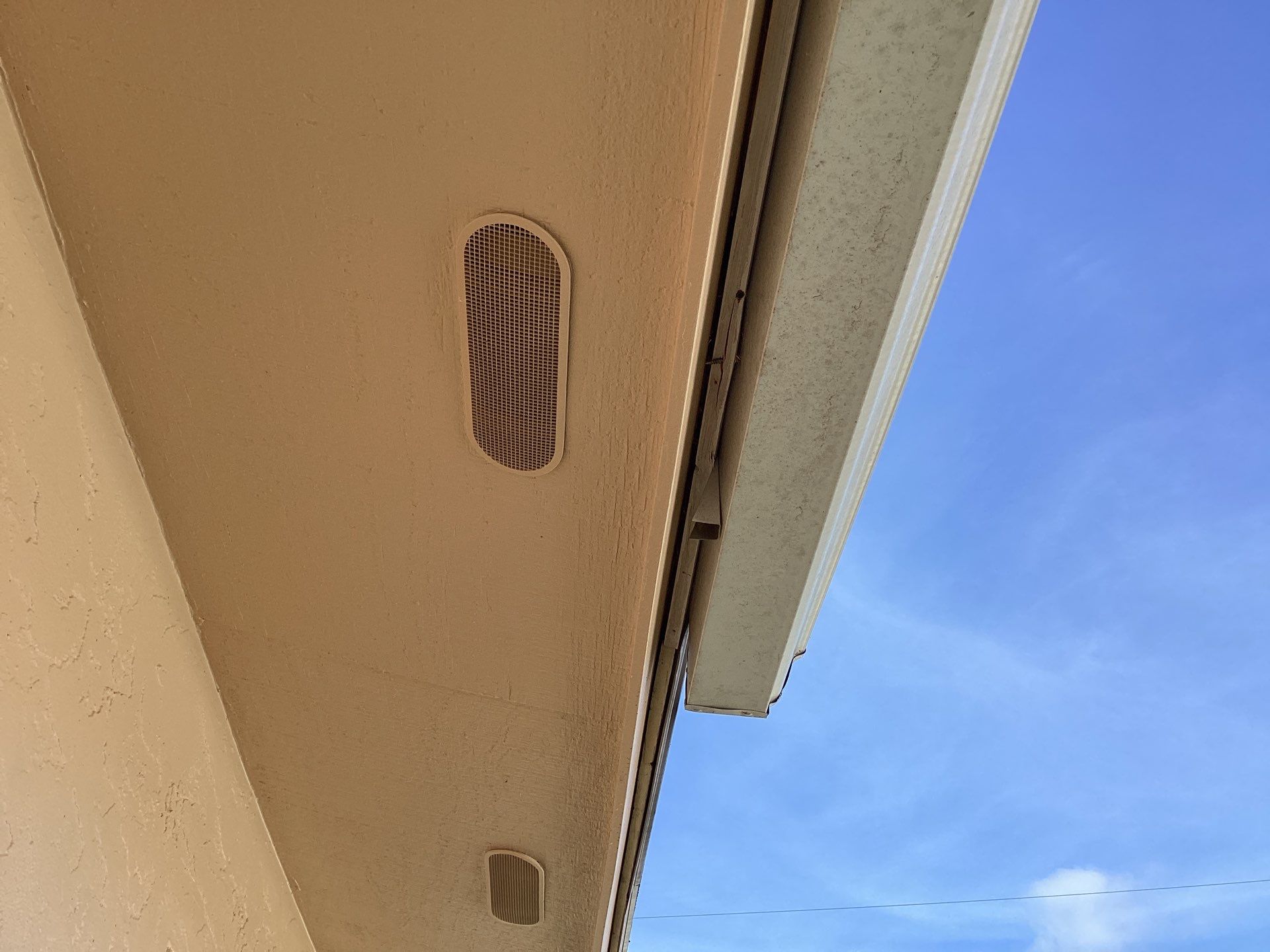 White K Style Seamless Gutters using 3X4 Elbow Downspout in Cape Coral FL by Gutter Professors
