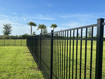 Aluminum Fence Installation using Black 3 Rail Aluminum Fence