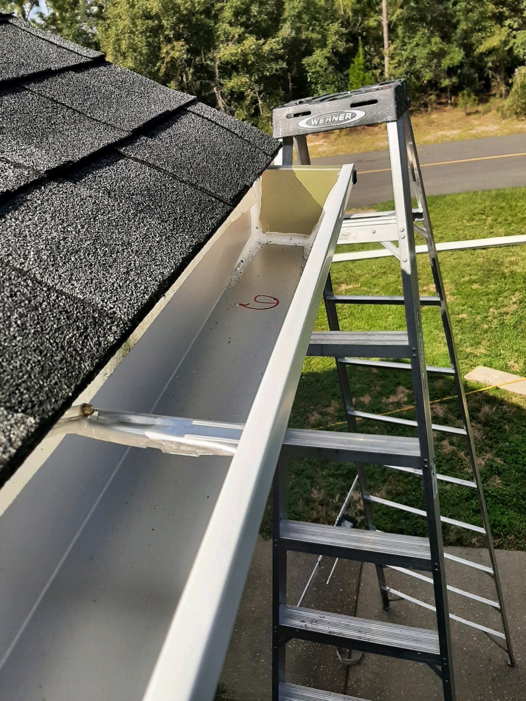 Gutter Installation using White K-Style Seamless Gutters by Gutter Professors