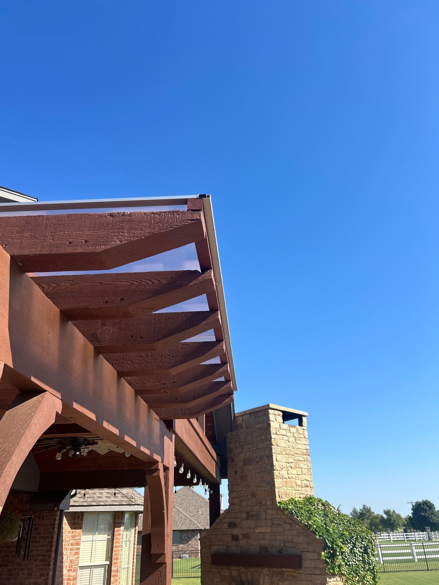 Siding Replacement and Exterior Painting and Pergola Cover Install in Edmond, OK by McCann's Roofing and Construction