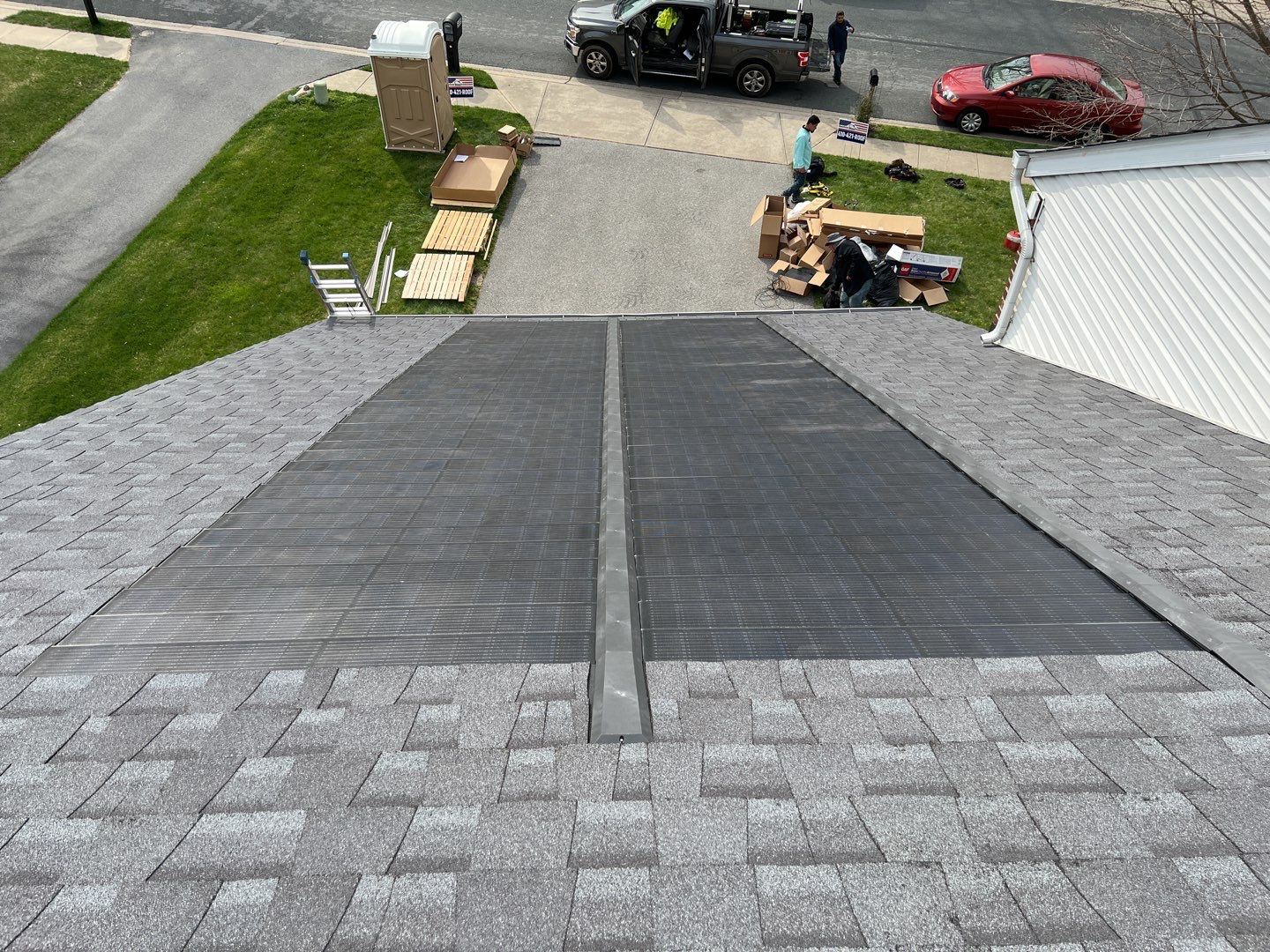 Solar Roof Replacement using GAF Timberline Solar Shingles by American Home Contractors