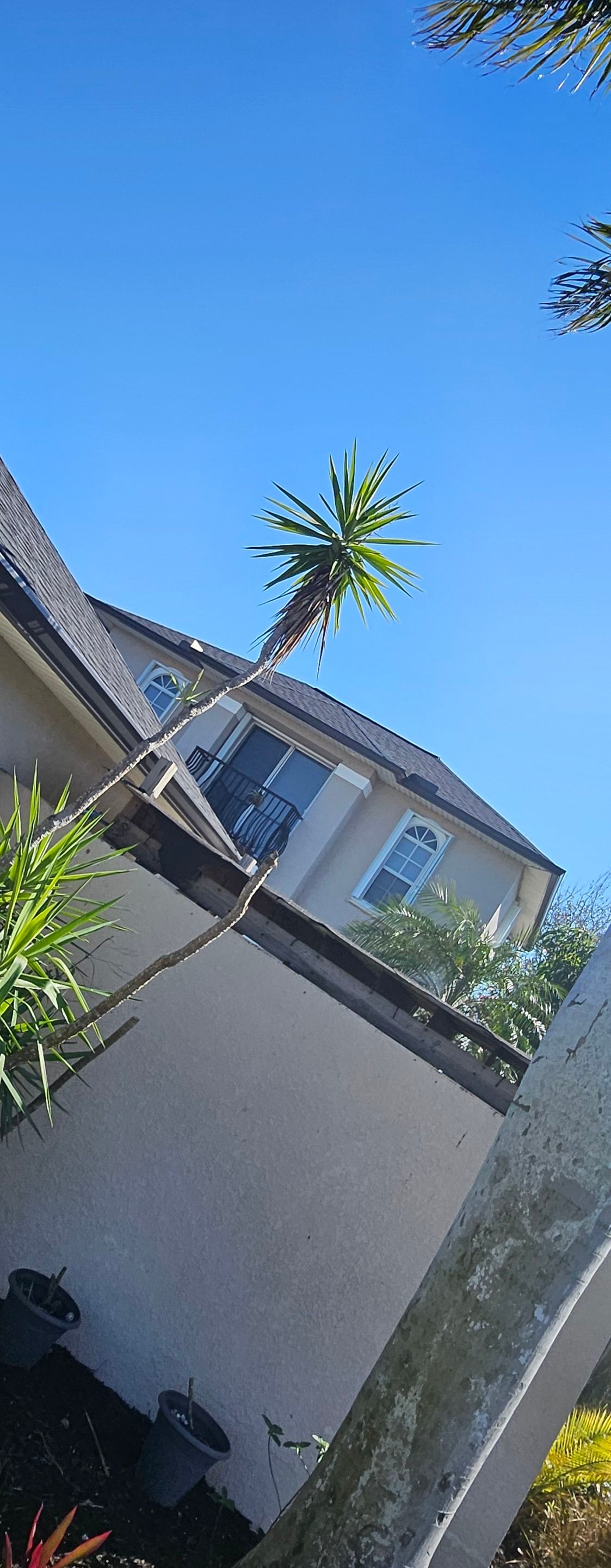 Dark Bronze Seamless Gutters using 6-Inch Seamless Gutters in Cape Coral FL by Gutter Professors