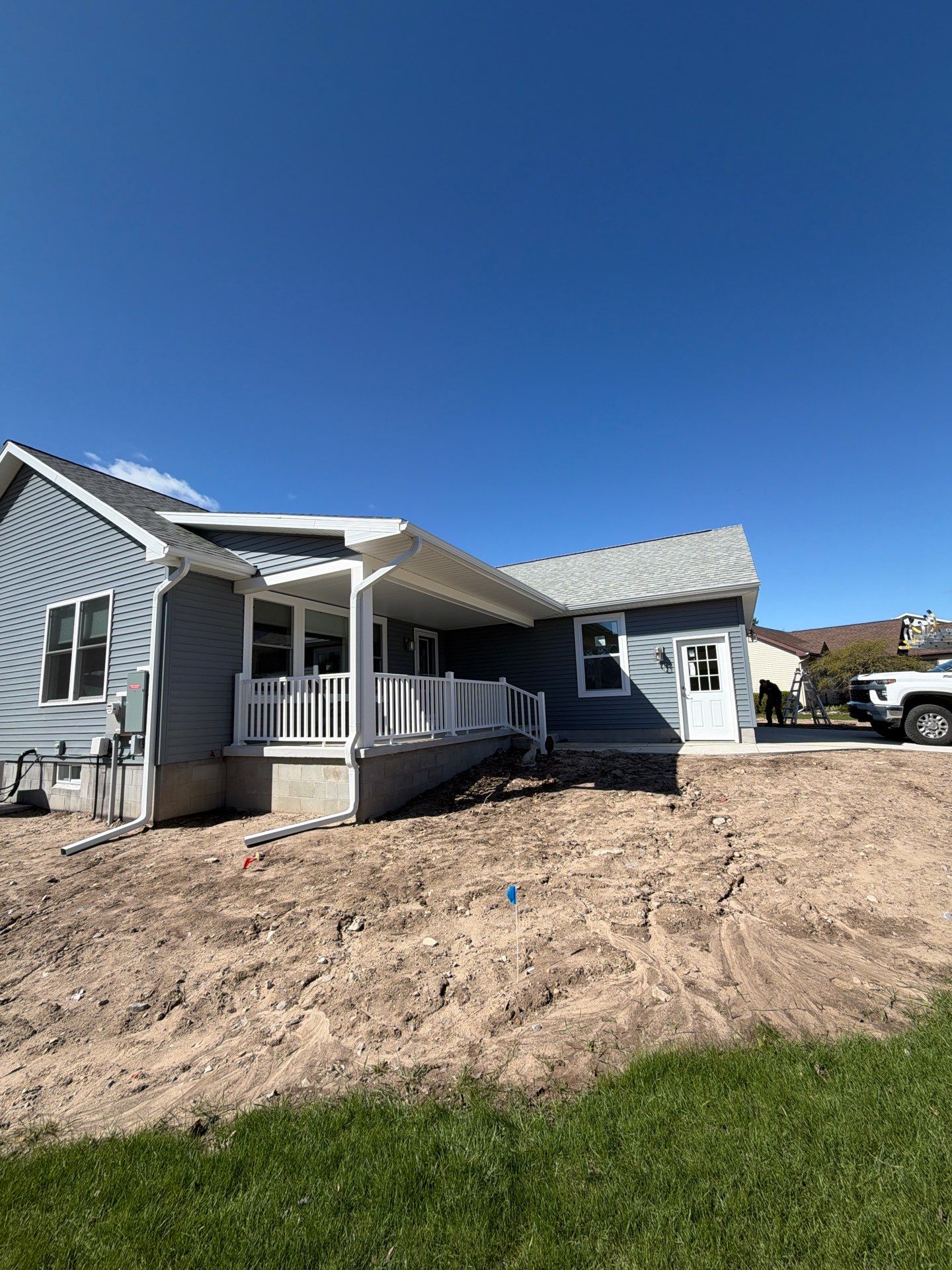 Gutter System Installation for New Home Construction in Petoskey by Rainbow Seamless Systems