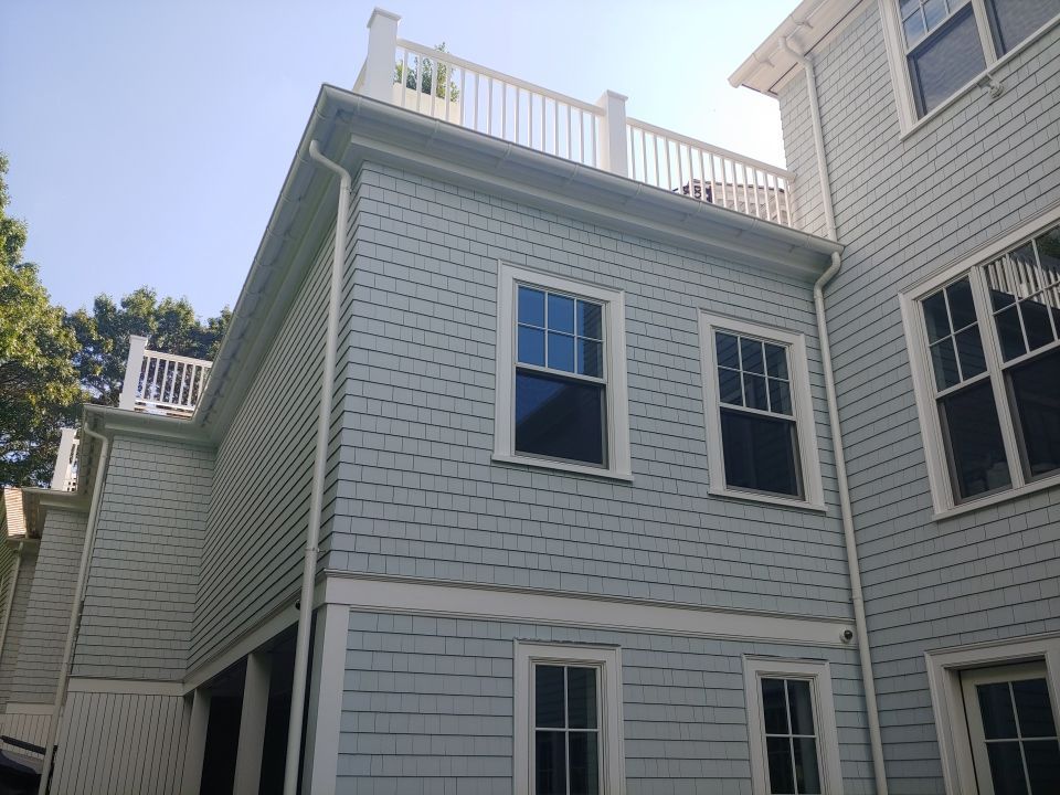 Gutter Installation using 6" Half Round Aluminum Gutter over Crown Moulding by Gutter Pro Enterprises