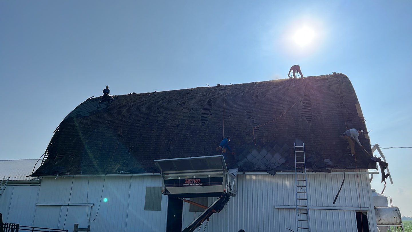 Barn Roofing Installation using GAF Timberline HDZ Charcoal by Nitro Roofing and Construction