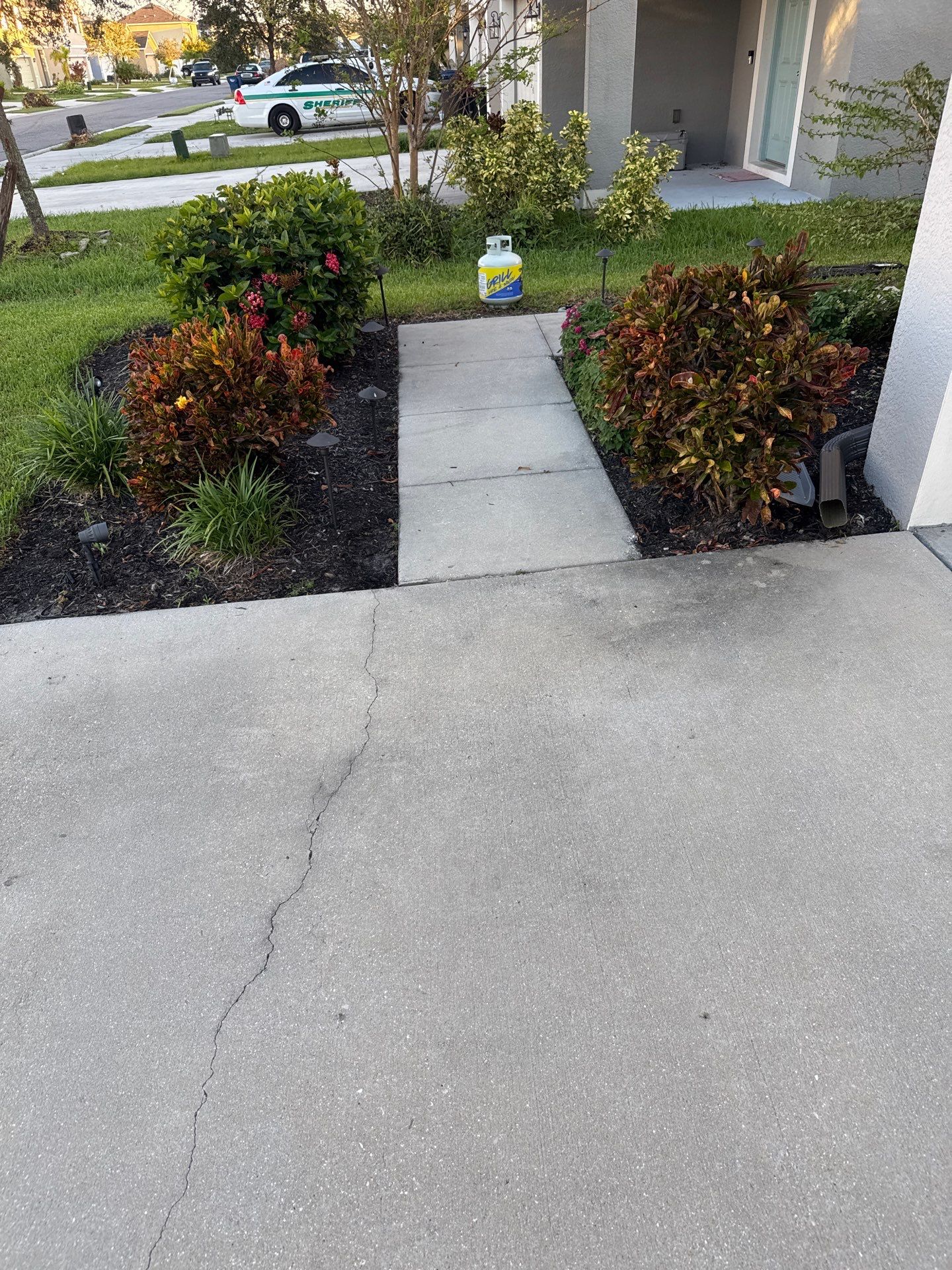 Concrete Driveway, Sidewalk, Street Curbing, and Entryway Cleaning in Willow Walk Community, Palmetto, FL by Sunshine AquaWash
