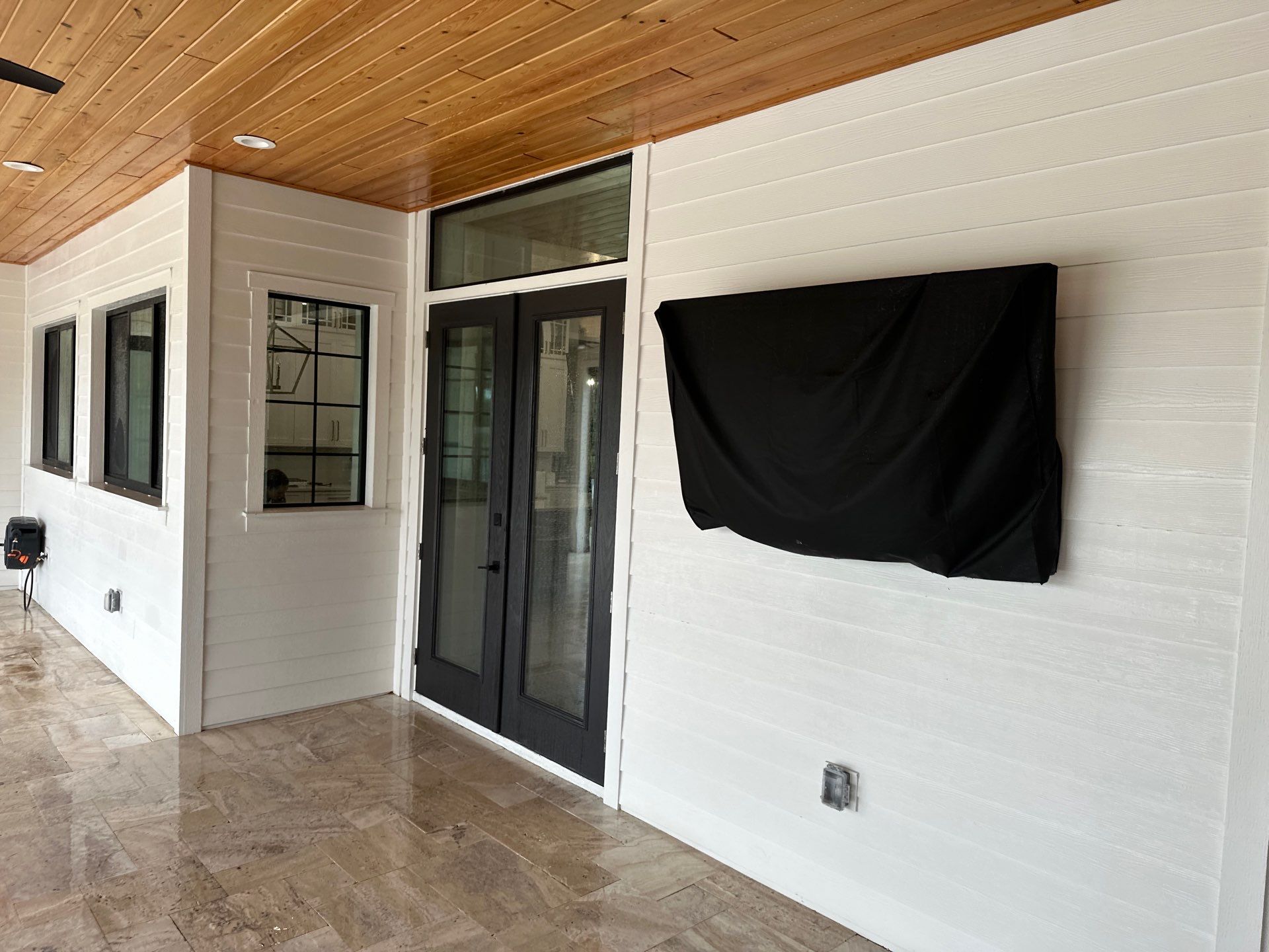 Complete Two-Story House Wash and Driveway Cleaning in Winding River Community, Bradenton, FL by Sunshine AquaWash