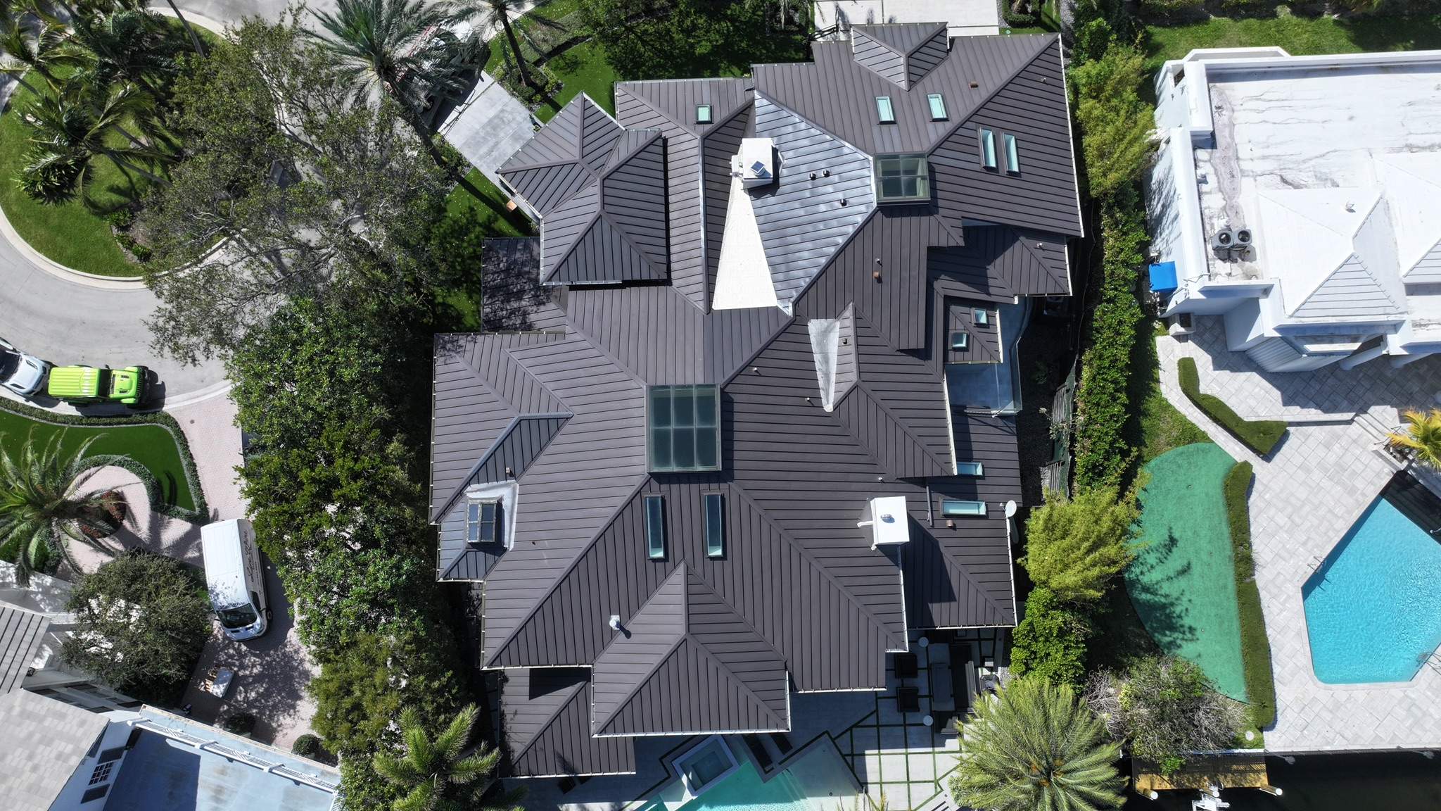 24ga 1.5" Mechanical Seam Dark Bronze by Total Roofing System The Metal Roof Experts