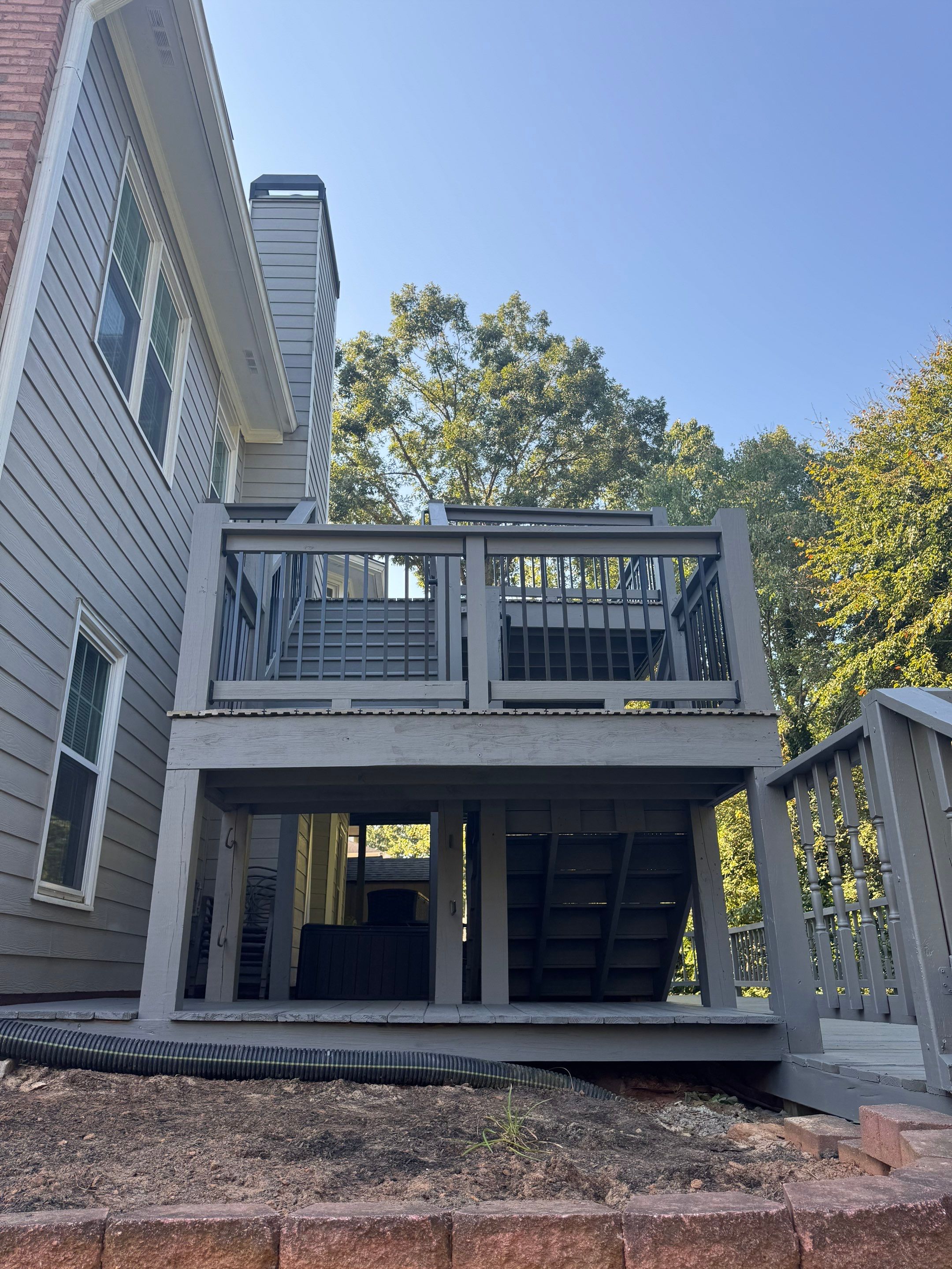 Multi-Level Deck Exterior Painting and Staining in Stonecrest by Swift Home Renovations