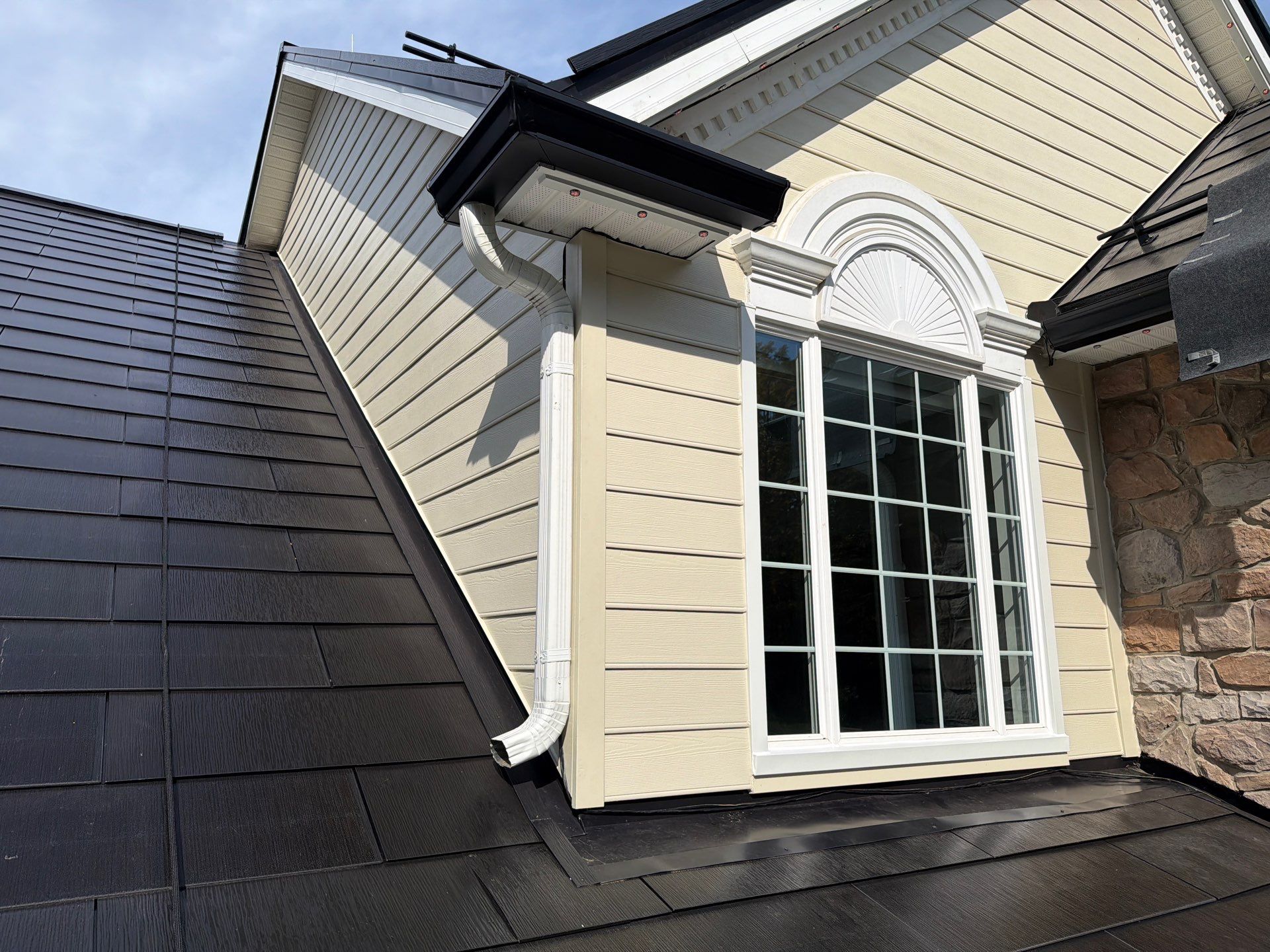 Beautiful James Hardie Siding & Tesla Solar Roof by American Home Contractors