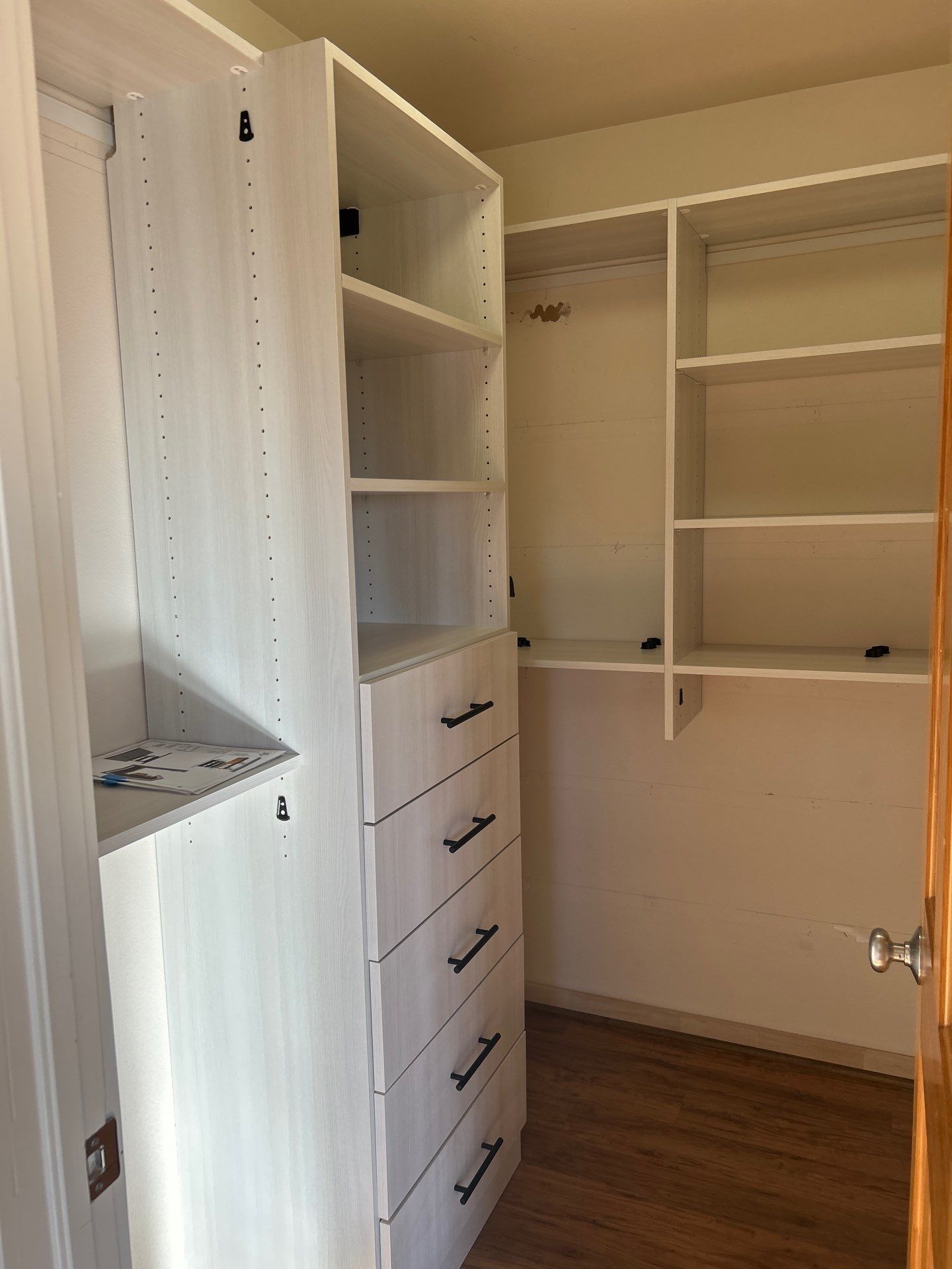 Walk-in Closet in a Small Space by Concept 32, Inc.