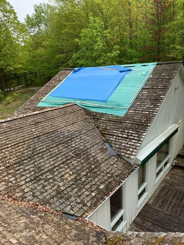 Residential Roofing Installation using 24 Ga Standing Seam Meta by Jay Carter Roofing & Sheet Metal