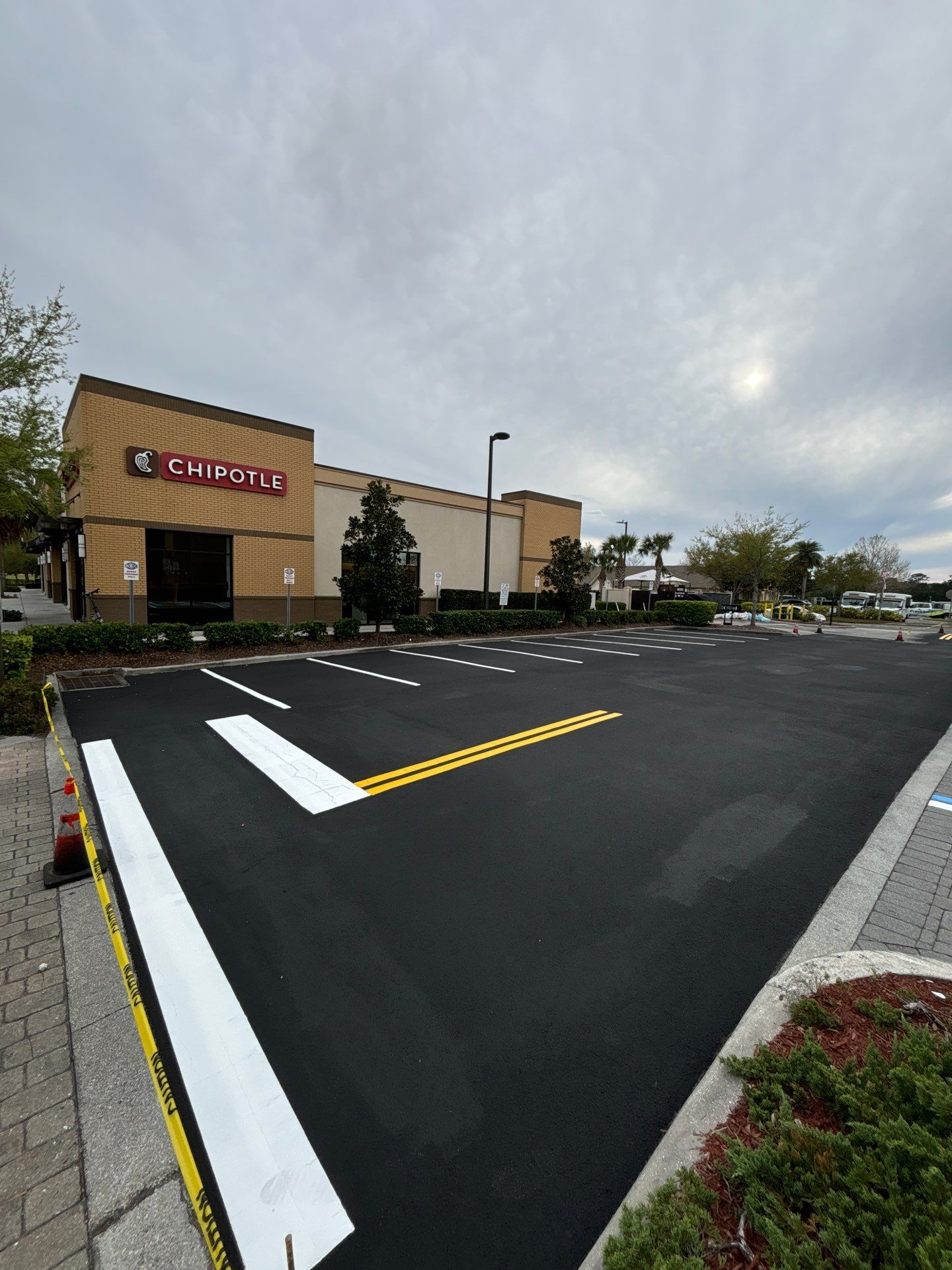 Brighter, Safer, Better: ABC Fine Wine & Spirits Parking Lot Makeover by Everline Coatings & Services - Southwest FL