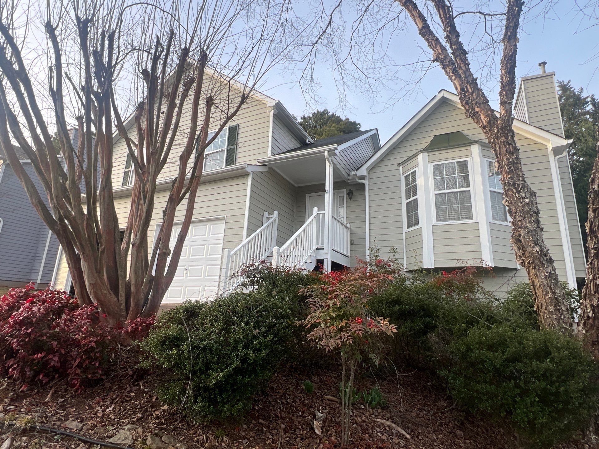 Exterior Residential Painting and Deck Staining in Kennesaw, Georgia by Swift Home Renovations