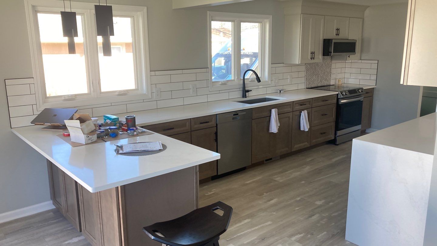 Interior Renovations, Kitchen Remodel, and Window Replacement by Ivy Lea Construction