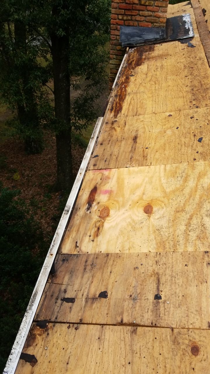 Residential Roofing Installation using Roof Replacement by American Roofing & Construction LLC