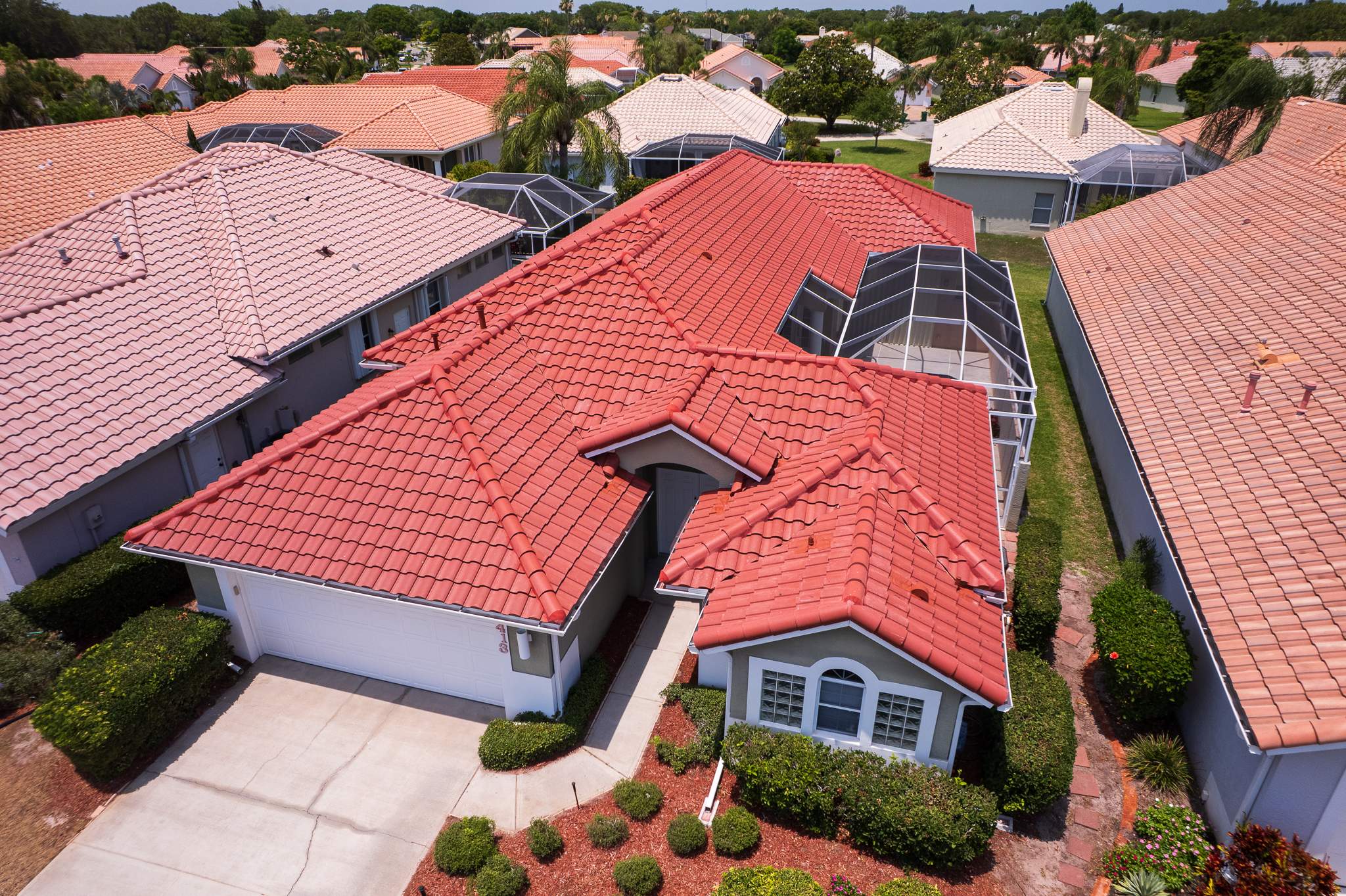 Tile Roof Replacement and Kona Red Range Installation in Melbourne by Wiedmann Construction & Roofing