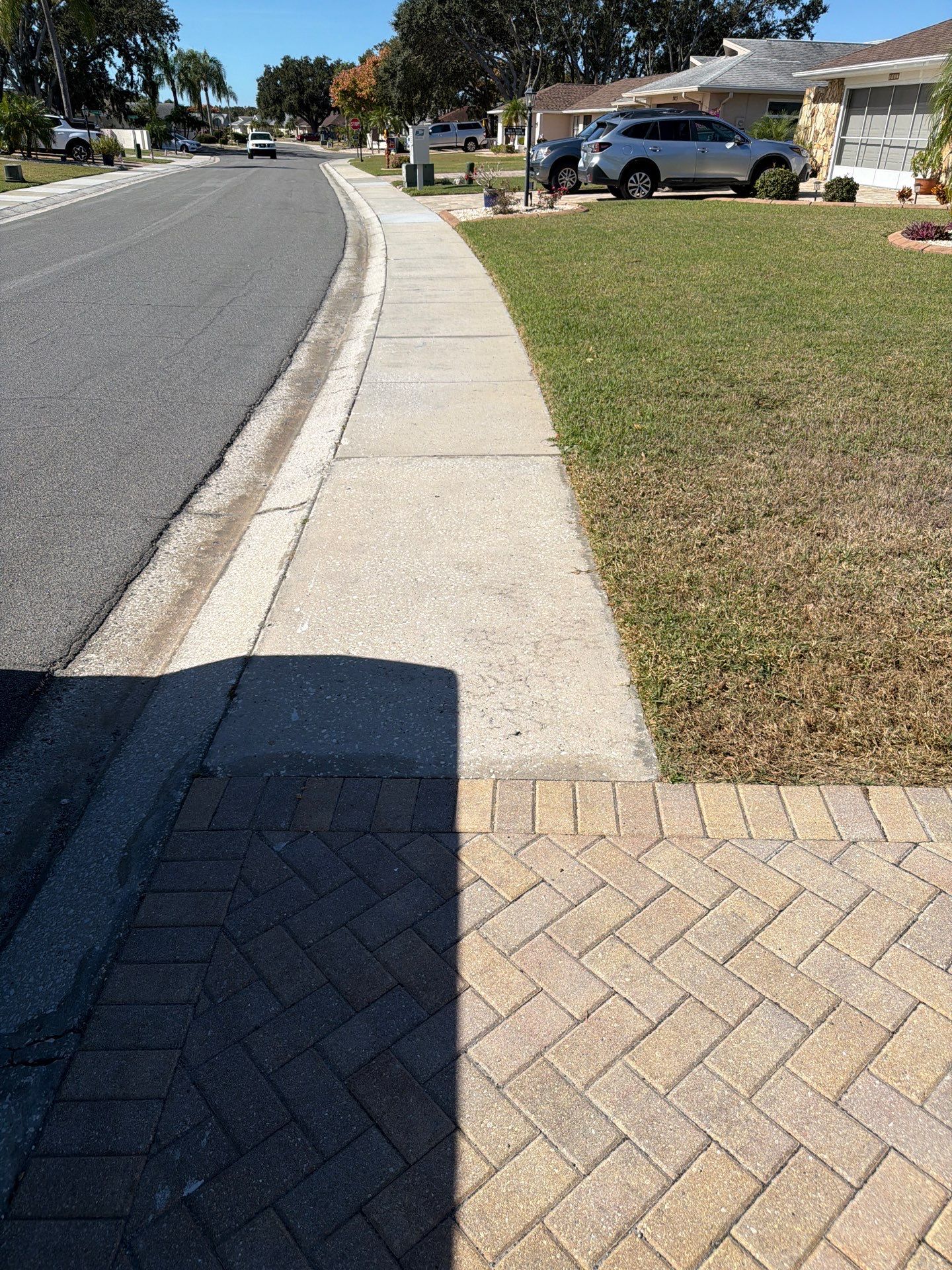 Restoring Herringbone Paver Driveway and Walkway in Sun City Center by Supreme Paver Experts