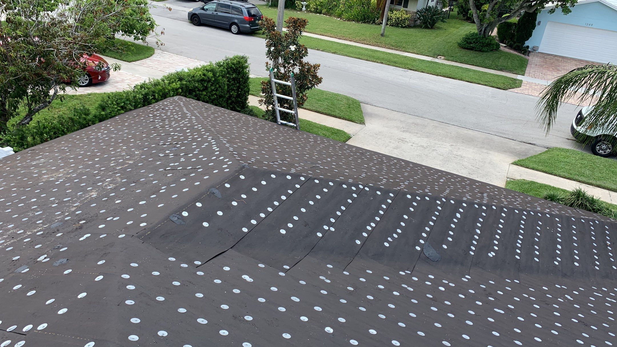 Residential Roofing Installation using 1" Nail strip metal roof by BLUES BROTHERS ROOFING