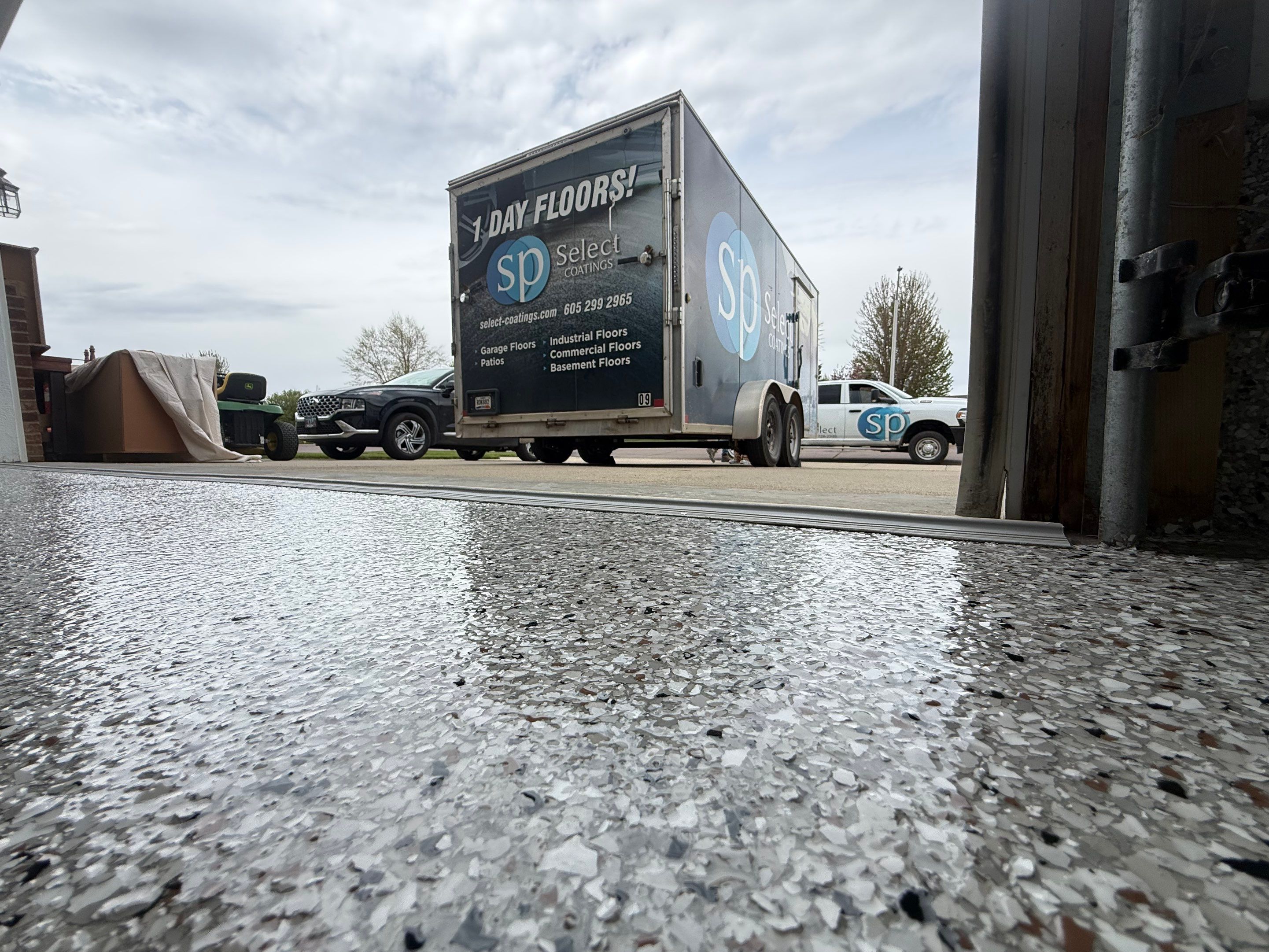 High-Gloss Epoxy Garage Floor Coating in Sioux Falls by Select Painting, Coatings & Garage Cabinets