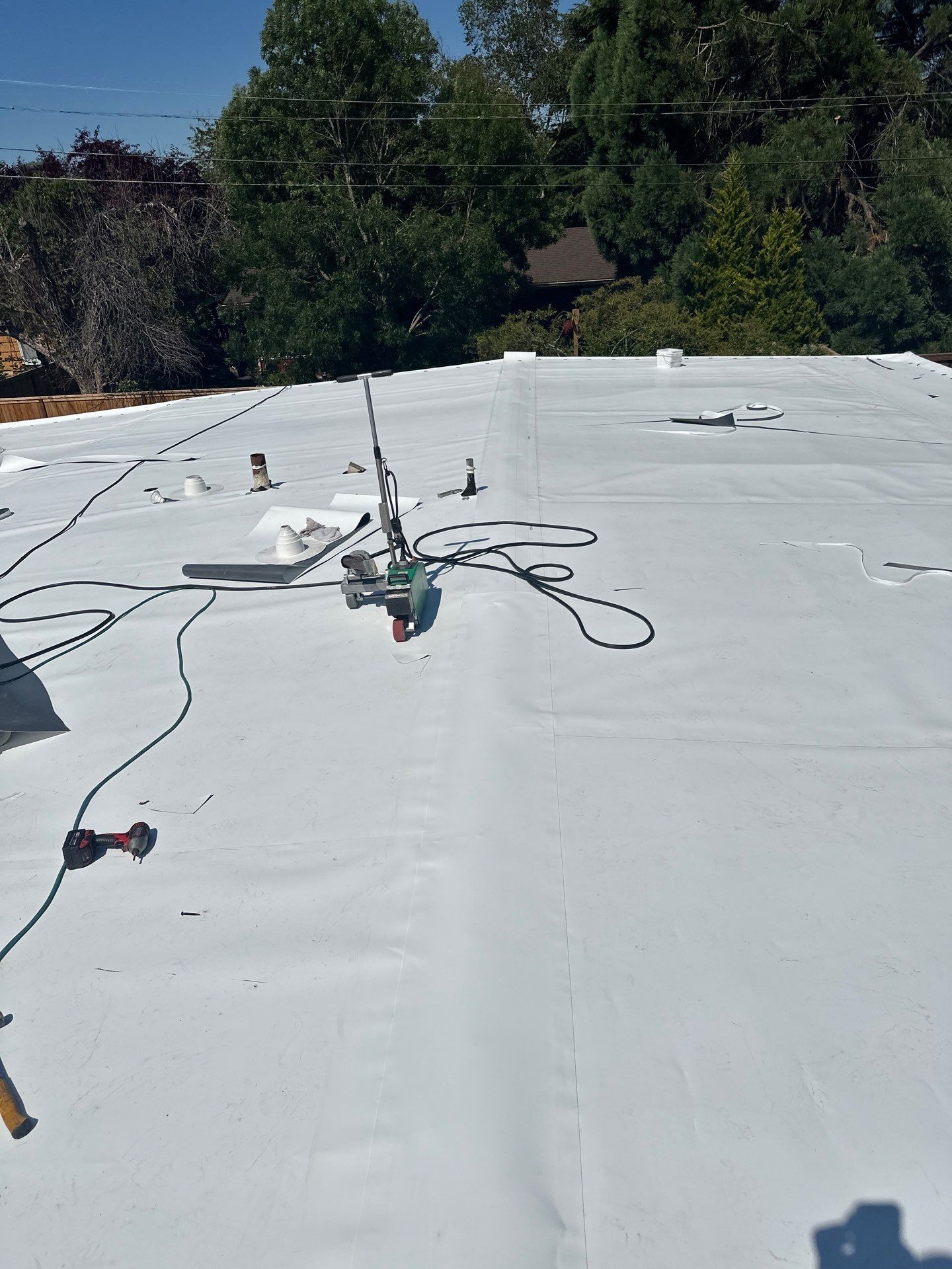 Residential Flat Roof Installation using GAF 60Mil TPO  by Orezona Building & Roofing Company, Inc.