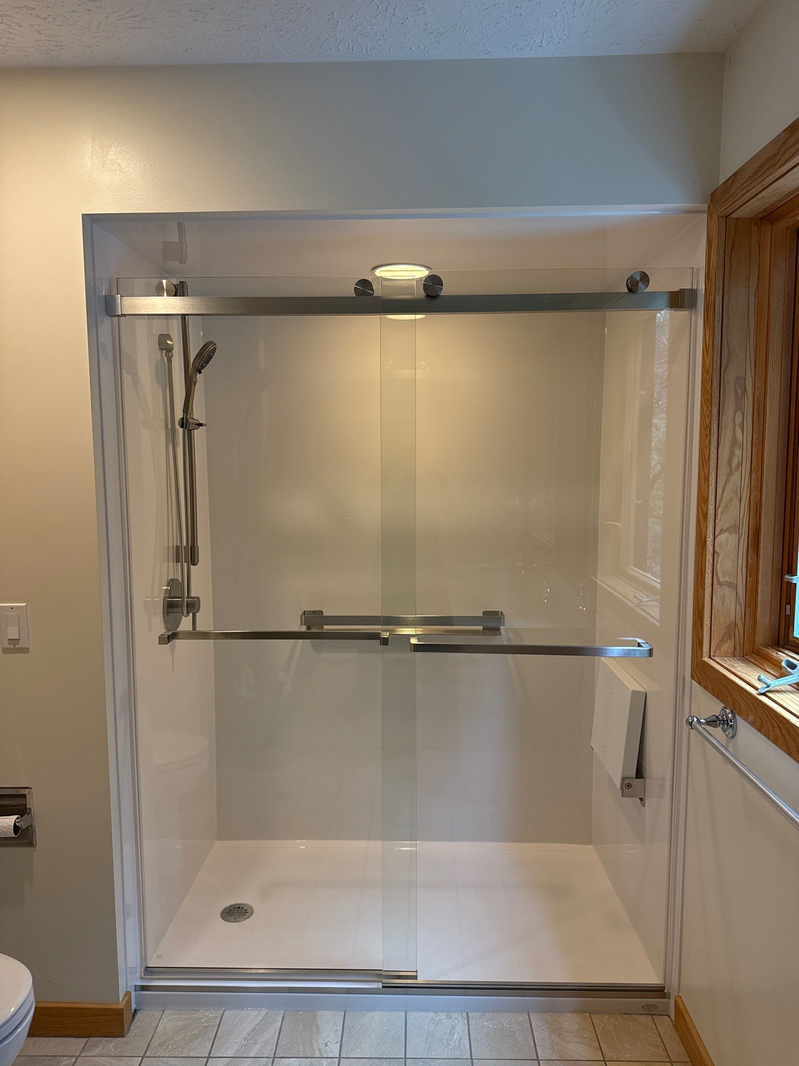 Traverse City Jacuzzi Bath & Shower Remodel by Rainbow Seamless Systems