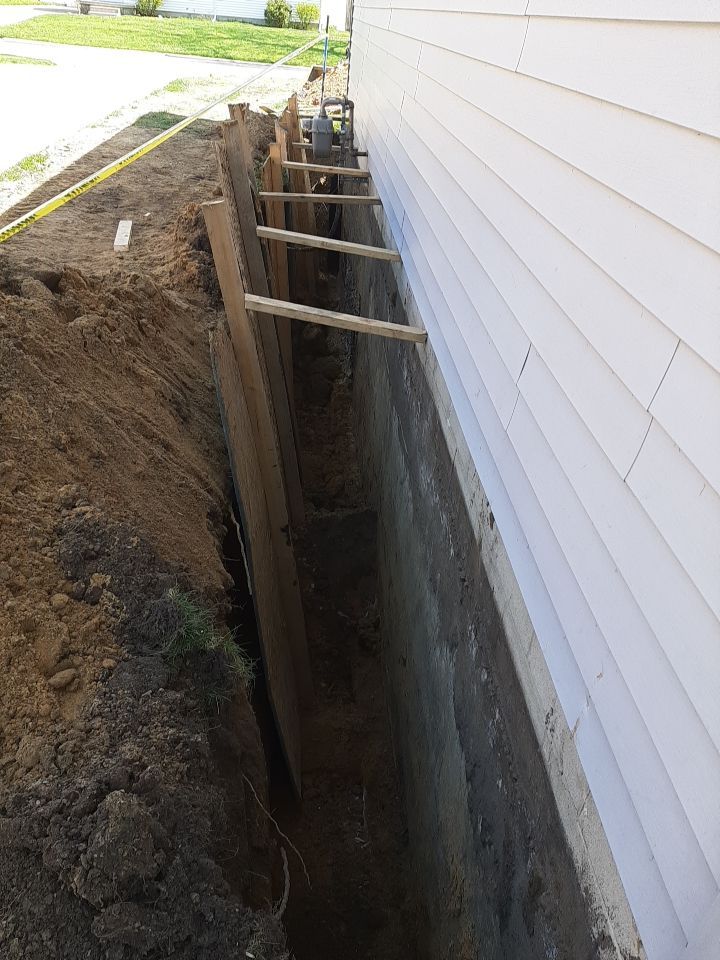Wall Straightening and Reinforcement using Embedded Fiber Reinforcement by Toledo Basement Repair 