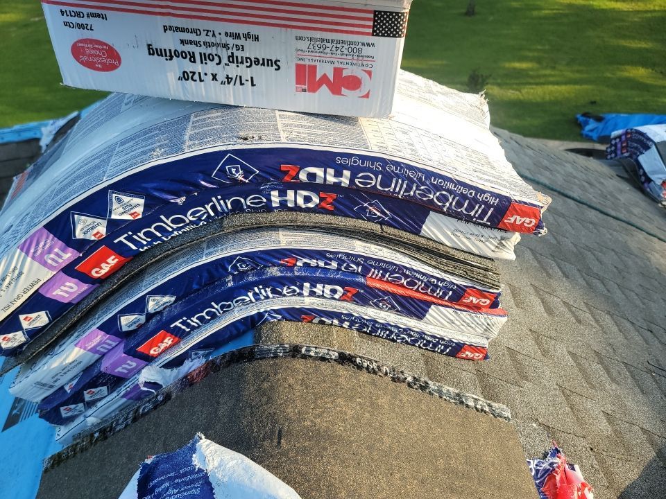 Residential Roofing Installation using Roof Replacement by American Roofing & Construction LLC
