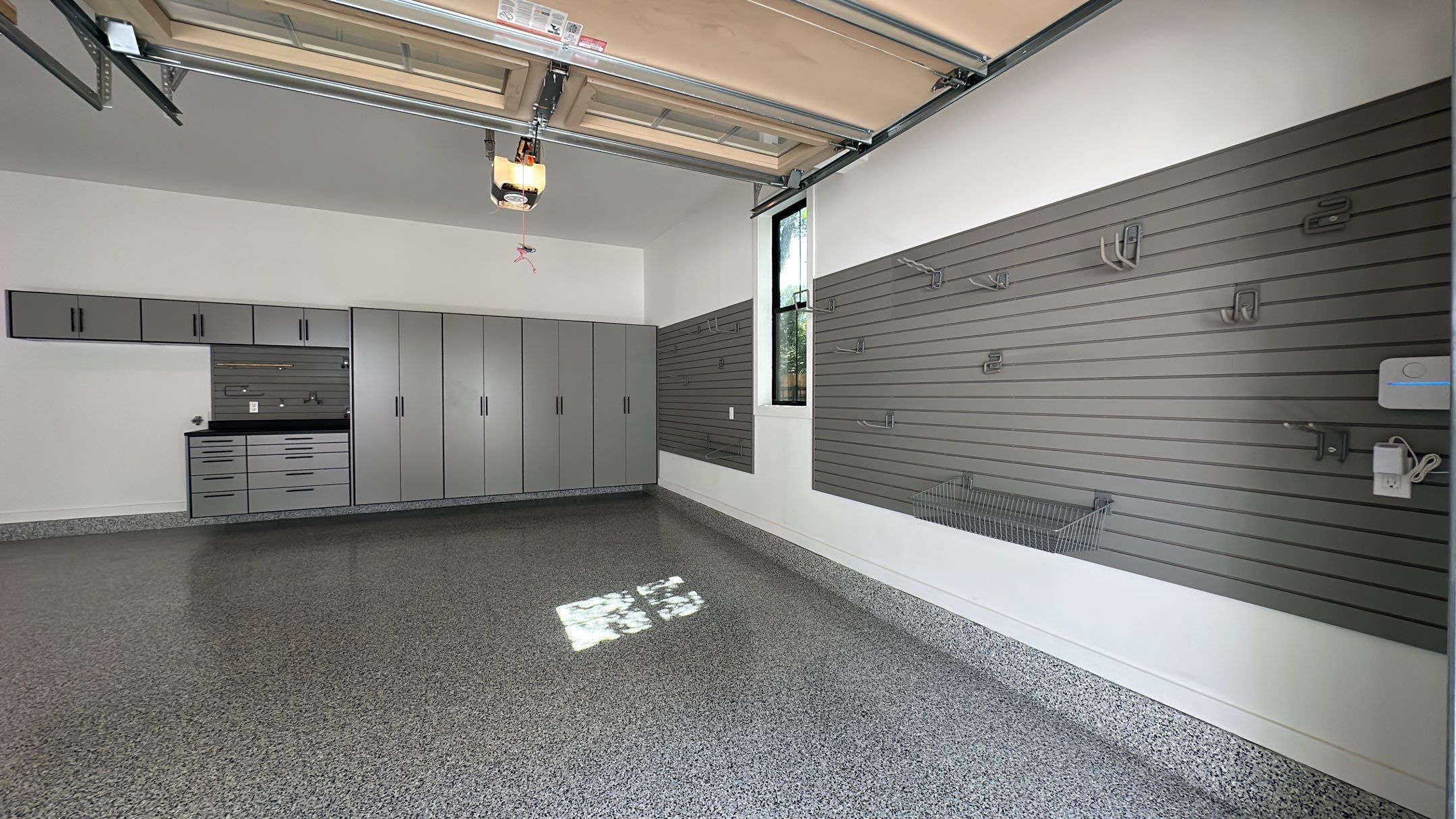 Jeanne E. transformed her garage with cabinets and a Banner Garage Floor by Banner Garage