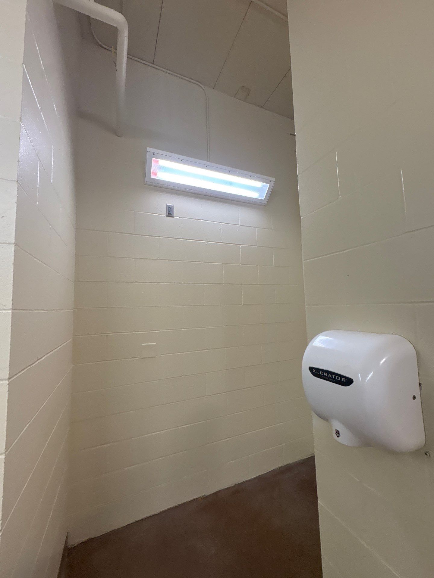 Commercial Restroom Interior Painting and Facility Updates in Sioux Falls by Select Painting, Coatings & Garage Cabinets