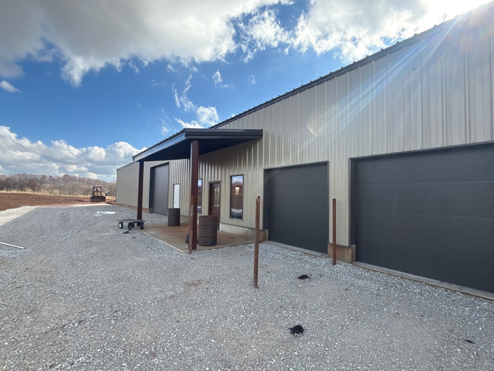 Metal Shop 6" Gutters & Downspouts Install - Color Musket Brown  by Titan Commercial & Residential Roofing 