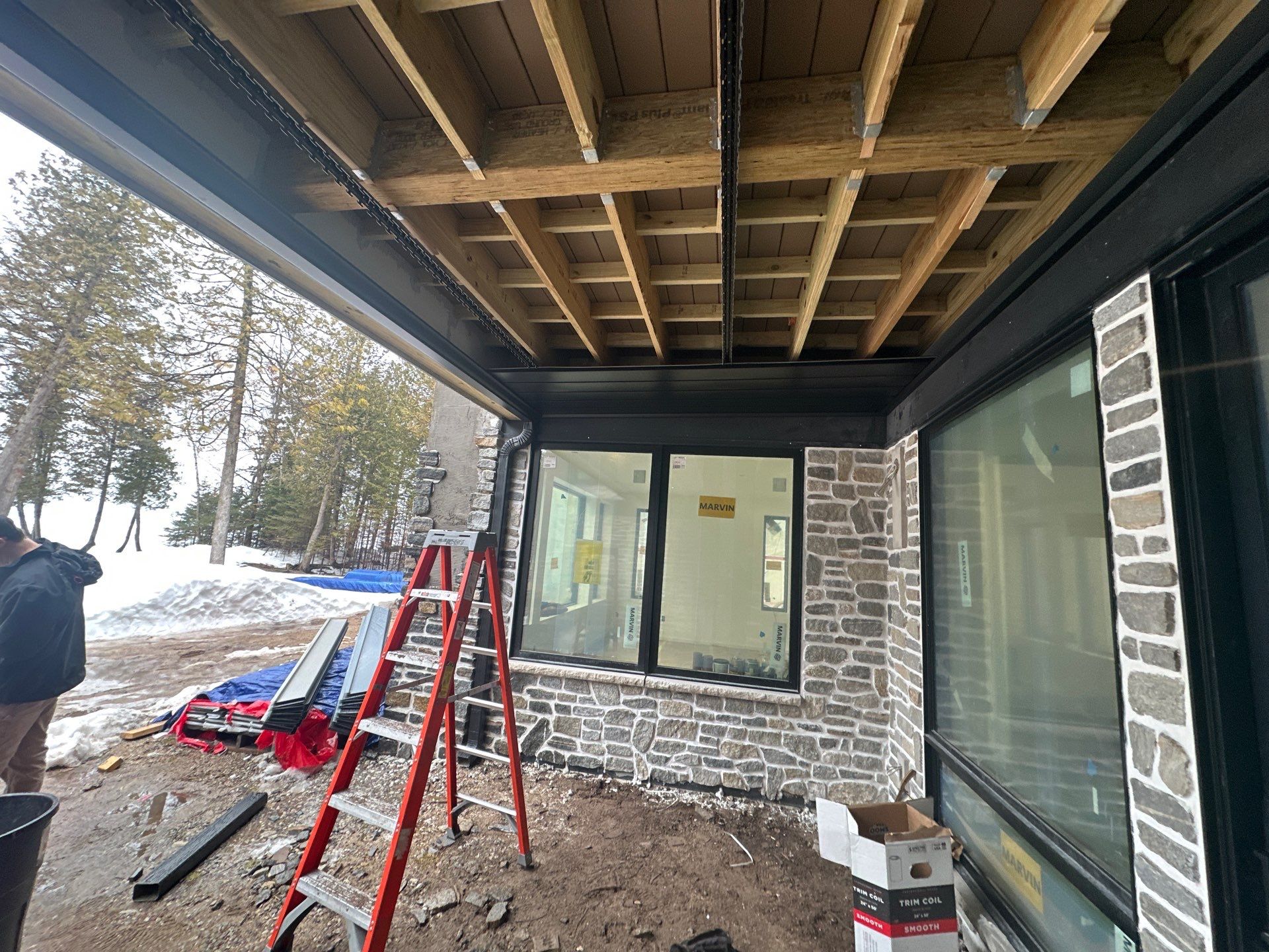 Underdeck Installation in Charlevoix, MI by Rainbow Seamless Systems