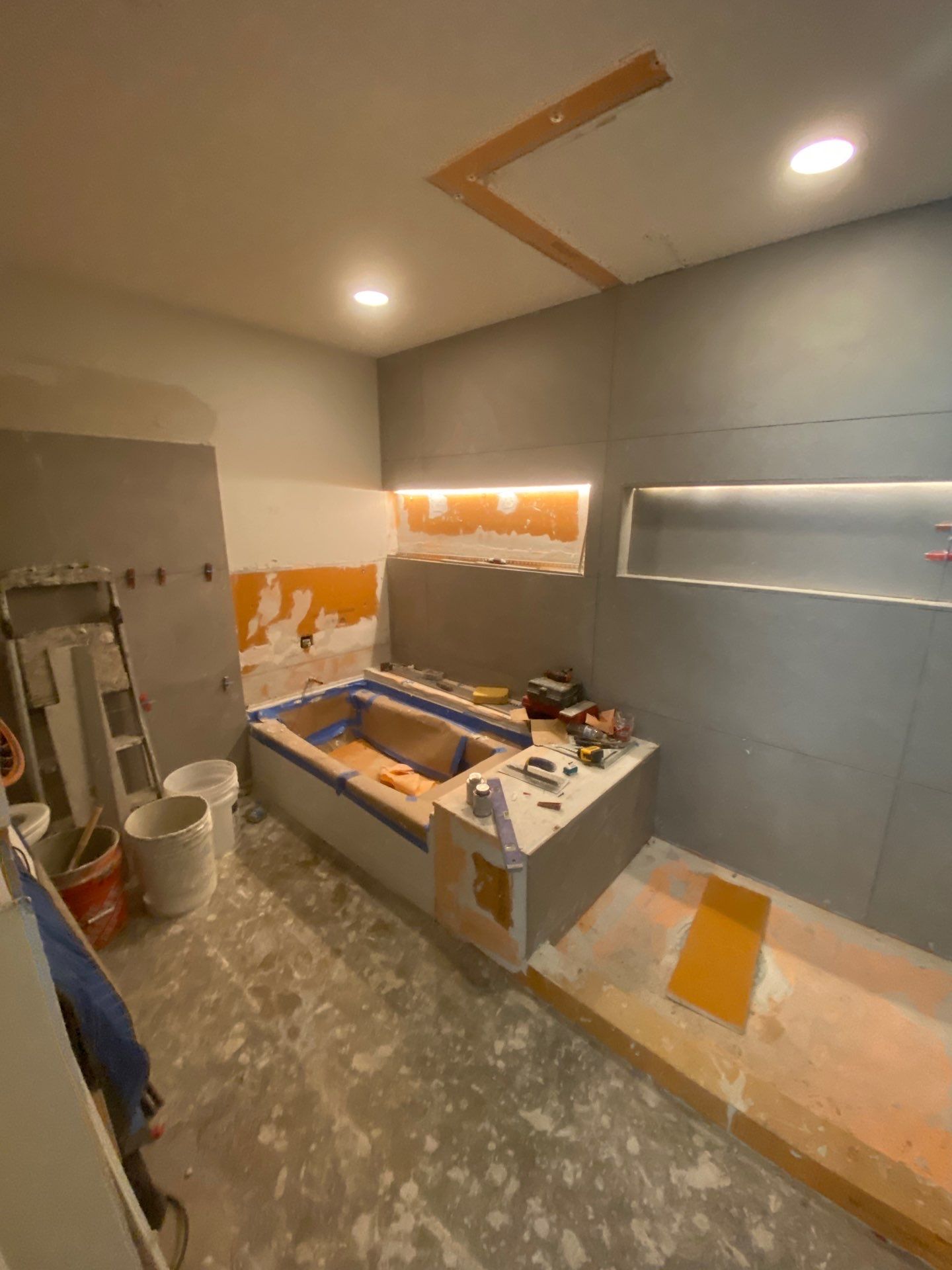 Modern Bathroom Transformation by Fine Line Flooring Inc.