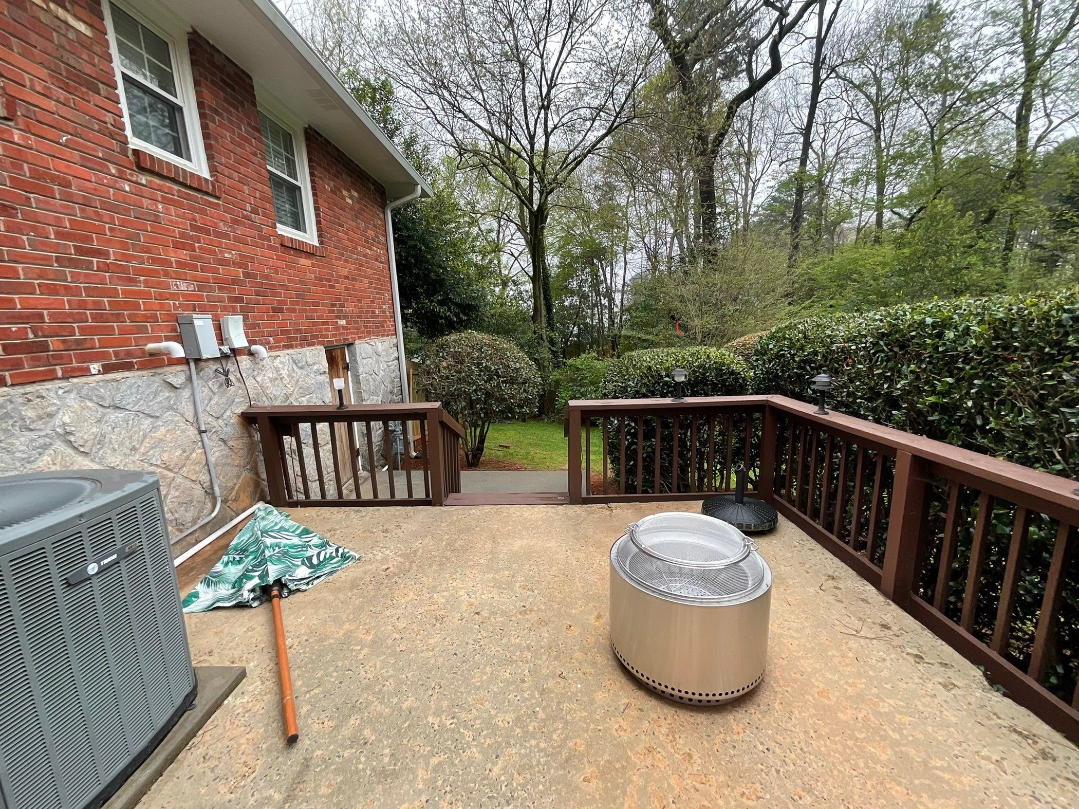 Custom Pressure-Treated Wood Deck and Railing Installation in Decatur by Swift Home Renovations