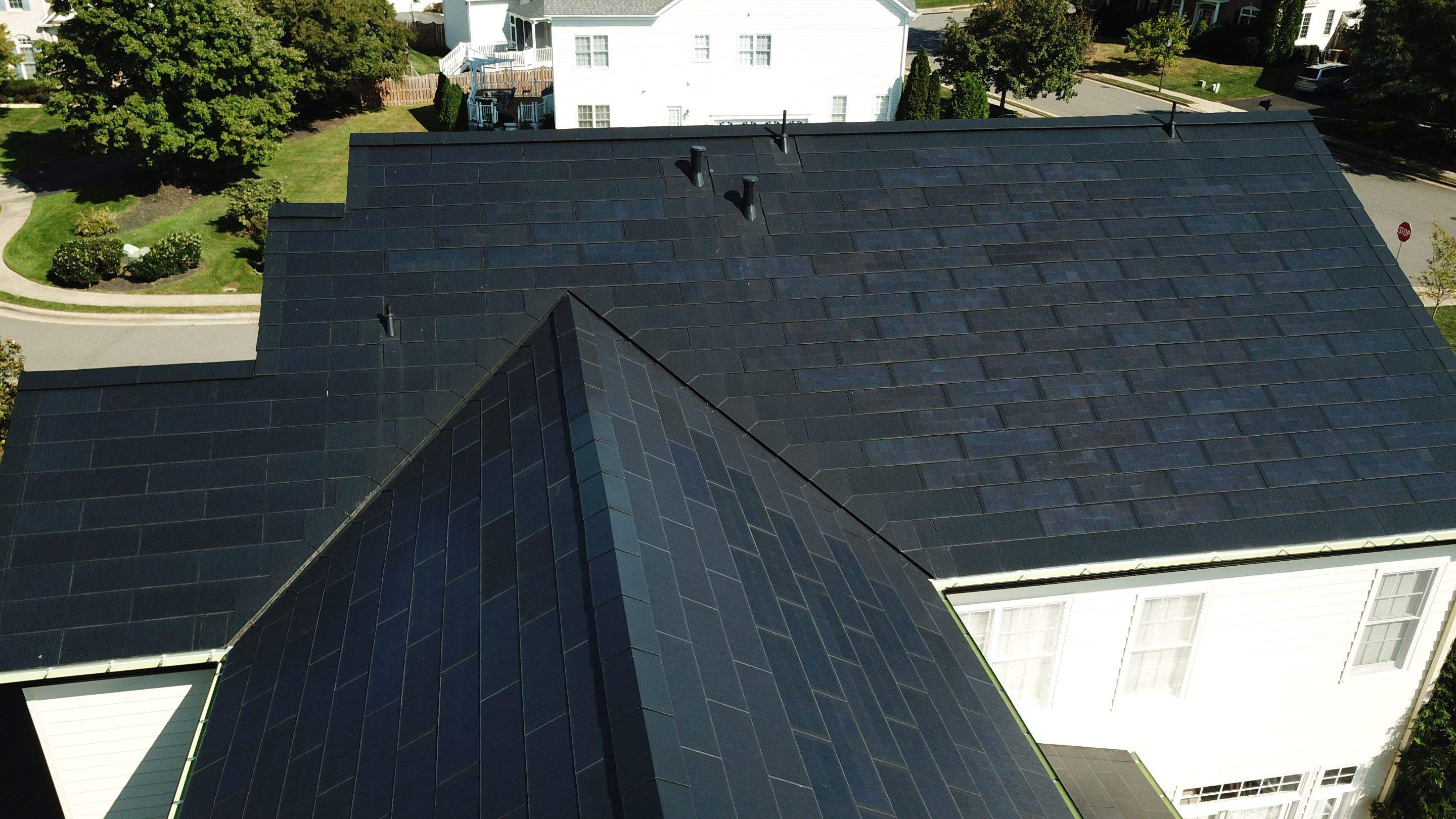 Tesla Solar Roof Replacement using Tesla Solar Roof V3 tiles by American Home Contractors