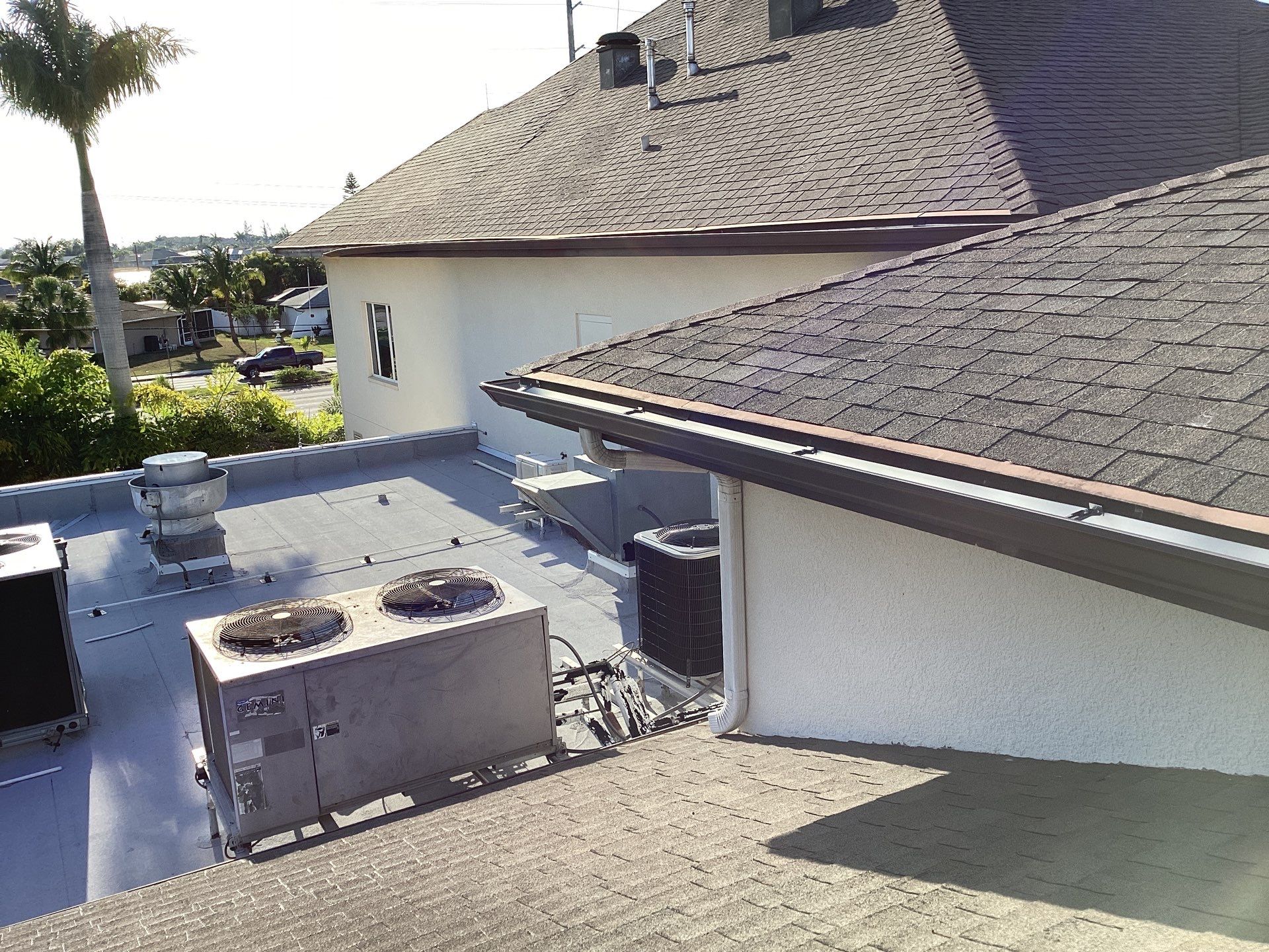 Musket Brown Seamless Gutters using Musket Brown Seamless Gutters in Capen Coral FL by Gutter Professors