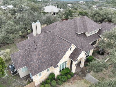 Residential Roof Replacement using 30 Year Laminate Shingles with High Profile Ridge