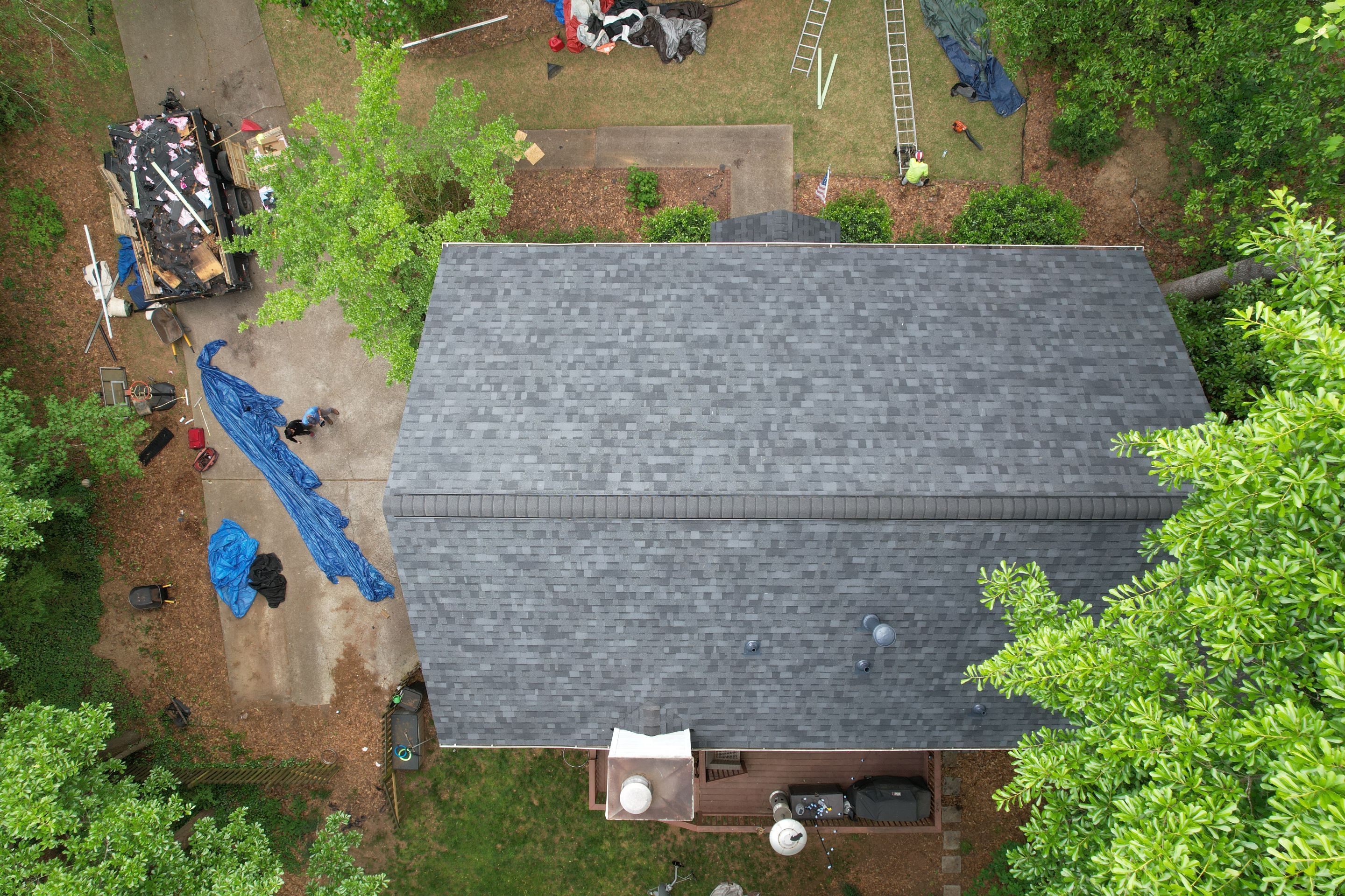 Residential Roof Replacement using Owens Corning Trudef Twilight Black by Inspector Roofing and Restoration