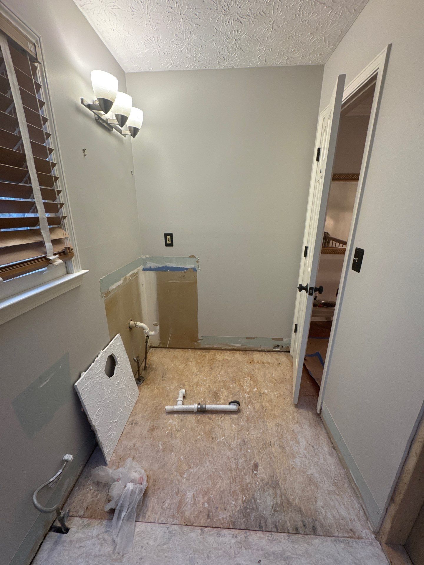 Smyrna Bathroom Remodel Featuring Sage Green Vanity and Hexagonal Tile by Swift Home Renovations