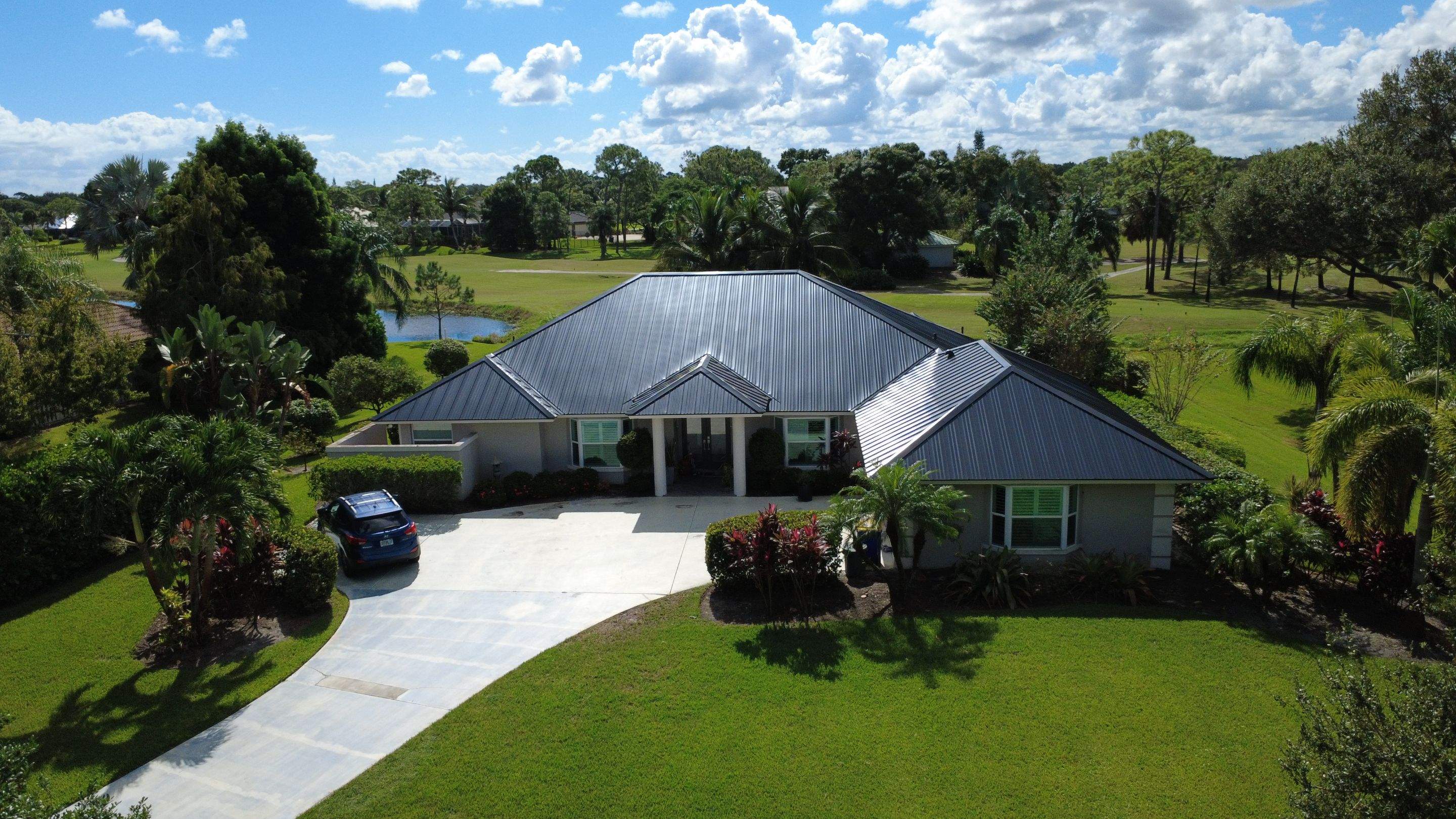 Kynar (Color Coated) Standing Seam Metal Roof Replacement by Sailfish Roofing