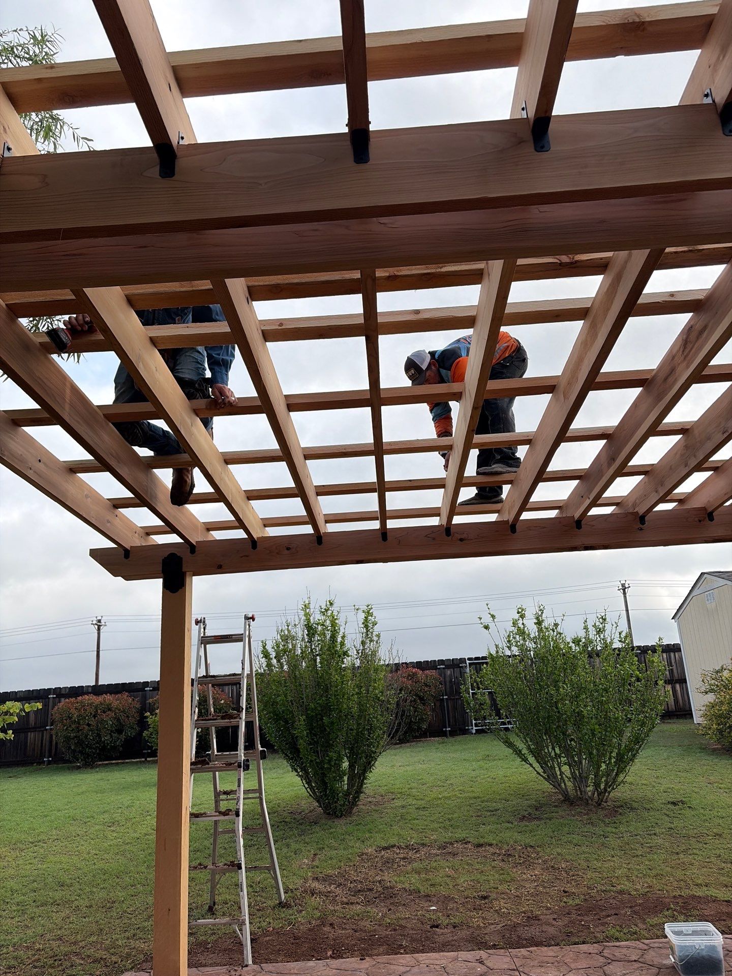 Stamped Concrete & Custom Pergola Build by Clays Services Inc