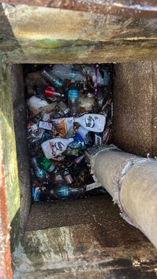 Cleaning Debris Filled Catch Basins