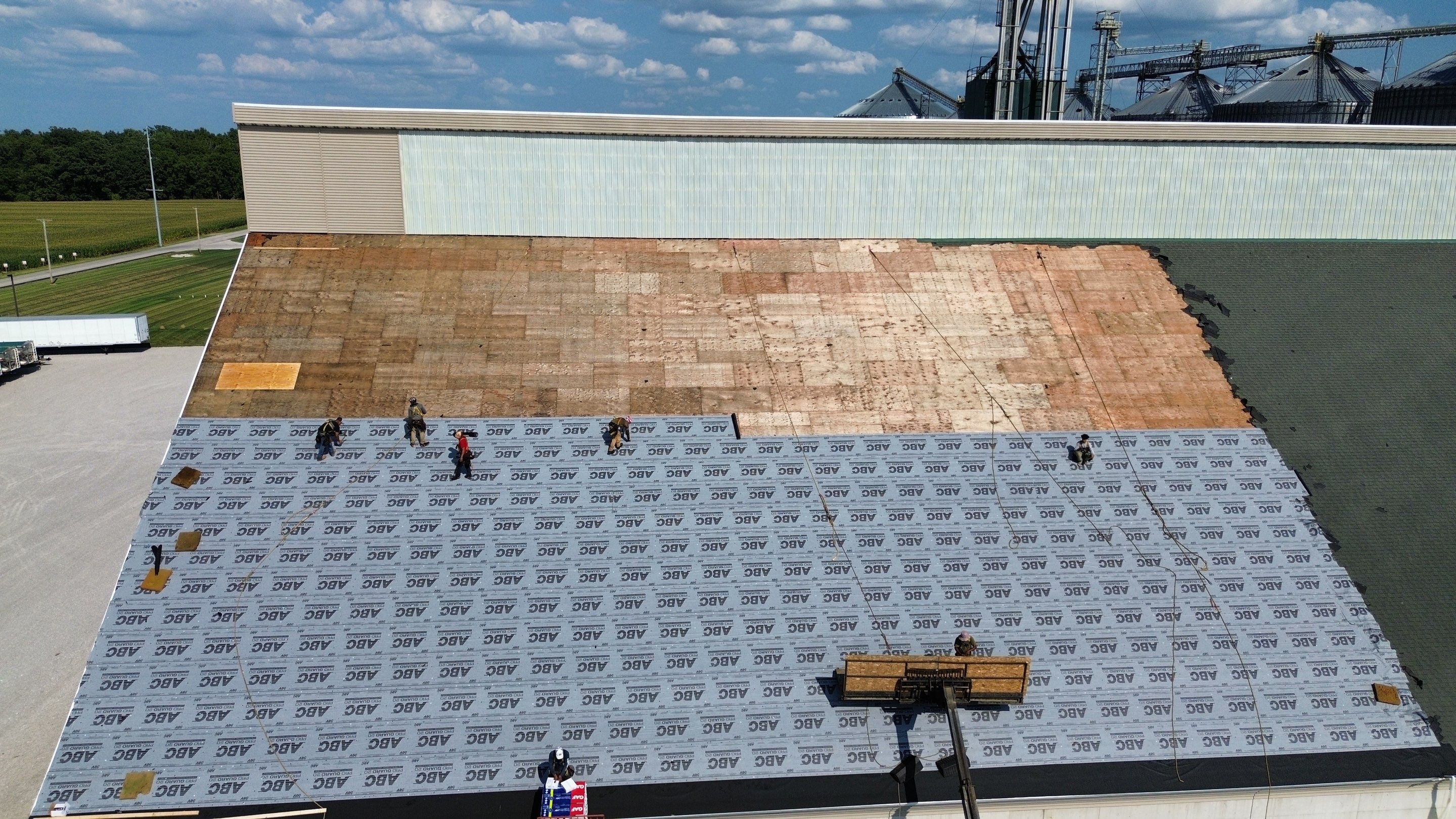 Commercial Roofing Installation using Timberline HDZ Shingles - Hunter Green by RoofX 