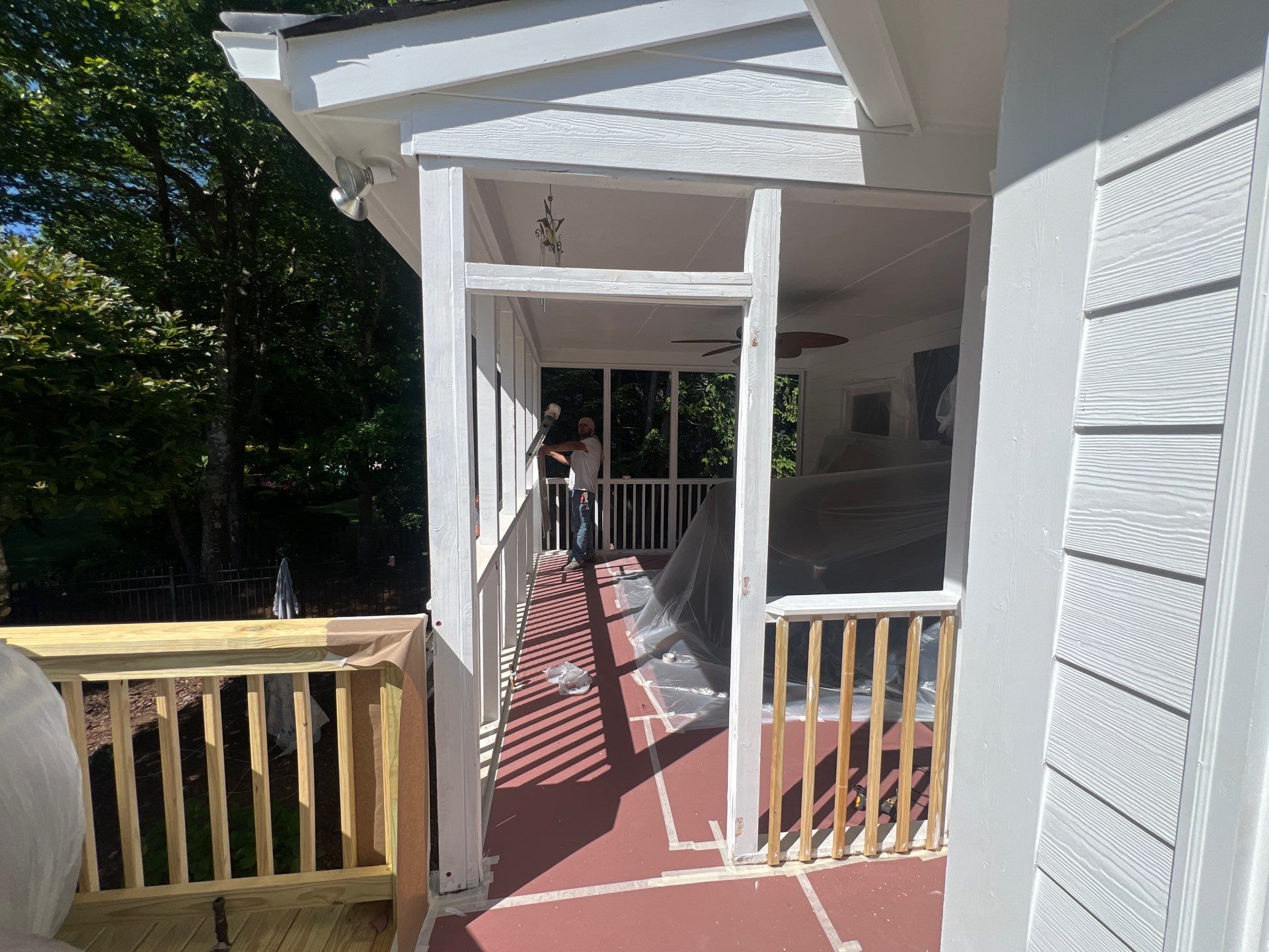 Multi-Level Pressure-Treated Wood Deck and Screened Porch in Acworth by Swift Home Renovations