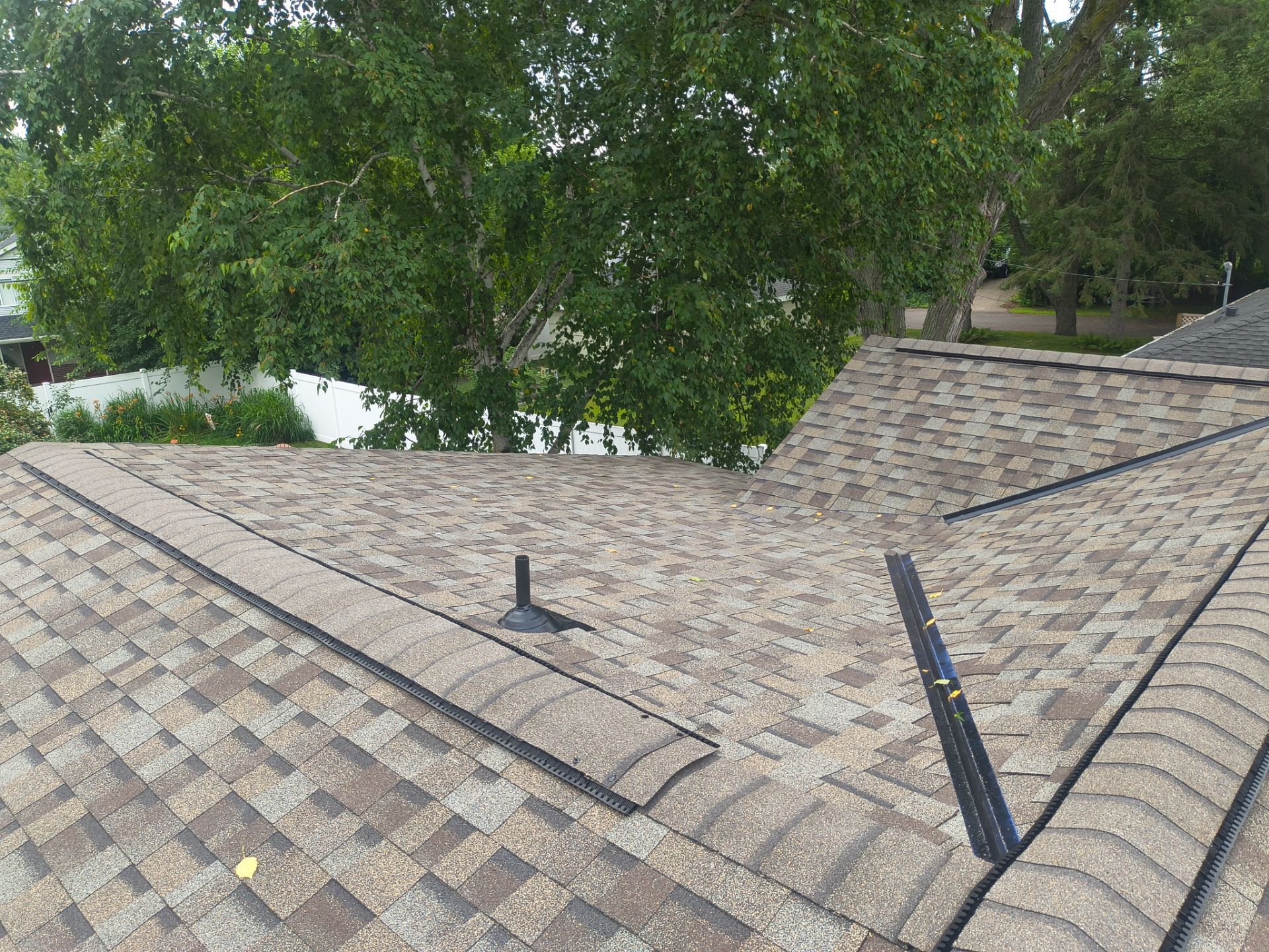 Owens Corning TruDefinition Roof Replacement with Gutters | Roseville, MN by Next Level Seamless Gutters / Exteriors Inc.