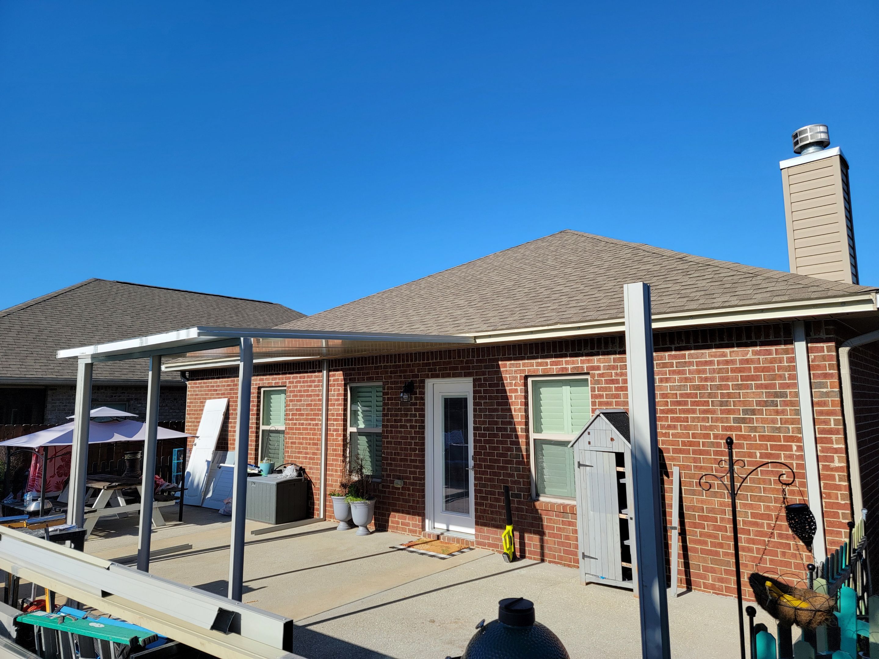 Poolside Screen Room & Patio Cover in Gulf Breeze by Titan Sunrooms