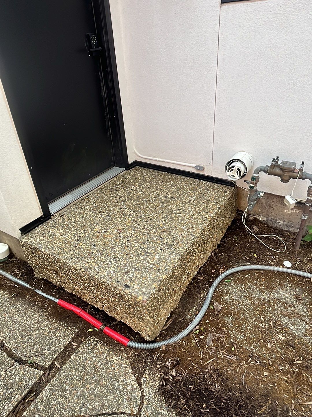 Aggregate concrete cleaning and sealing using Surebond SB-9000 by Northern Power Washing LLC.