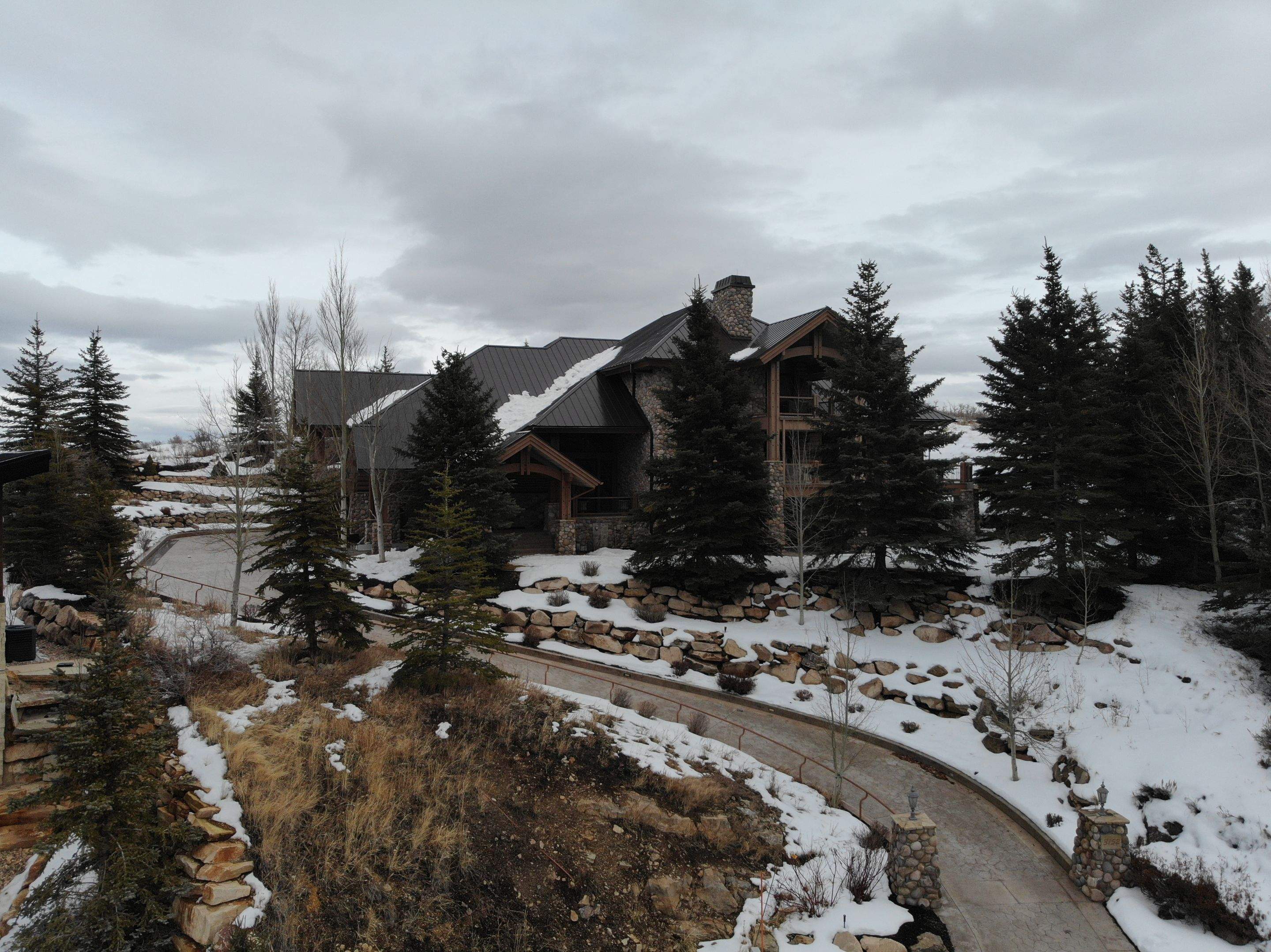 Standing Seam Metal Roof Replacement After Snow Damage by ASAP Roofing & Restoration